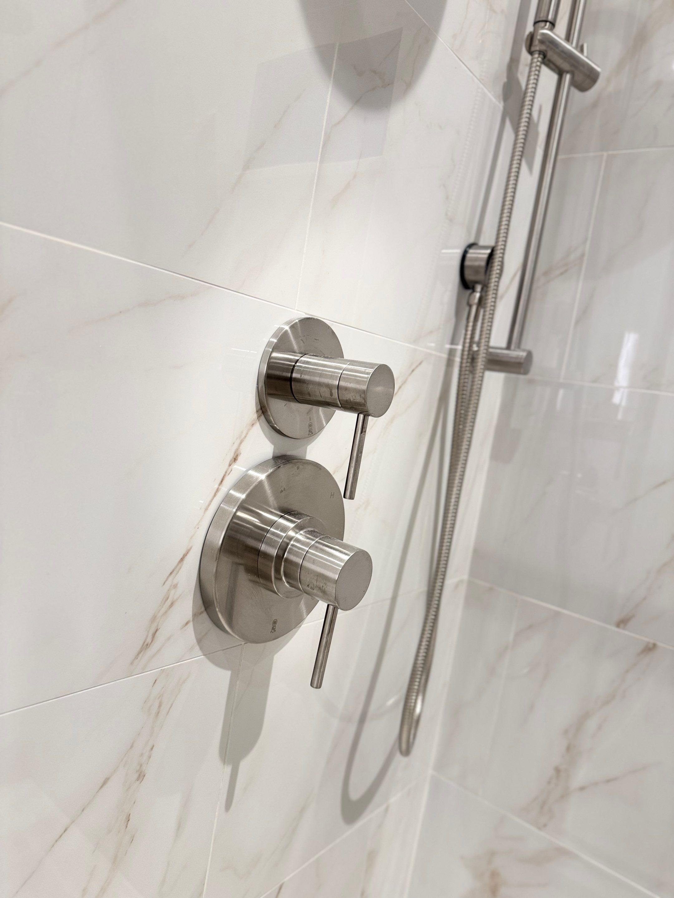 Bathroom Remodel using Tile by Home Concepts Construction