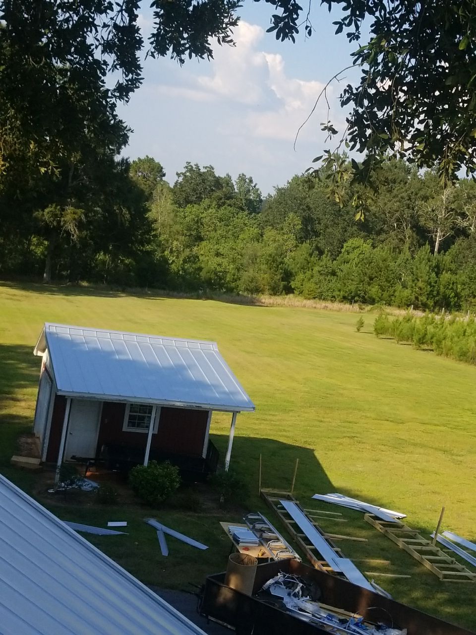 Residential Roofing Installation using Metal roofing by American Roofing & Construction LLC