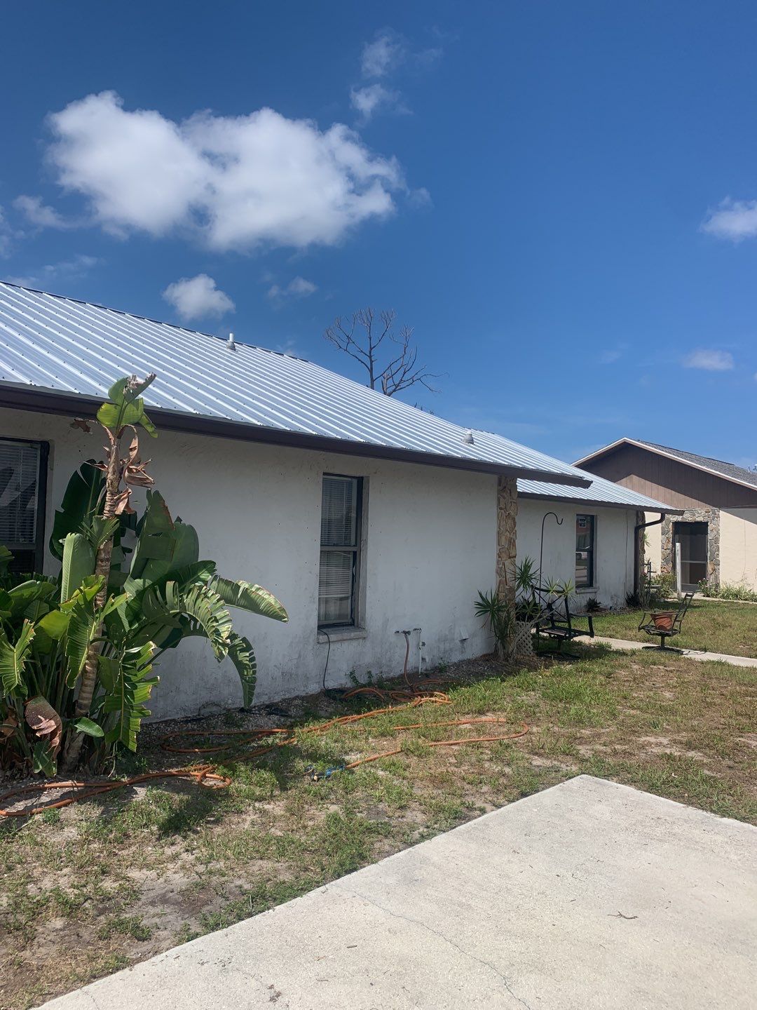 Aluminum Downspouts and Elbows in Englewood FL by Gutter Professors