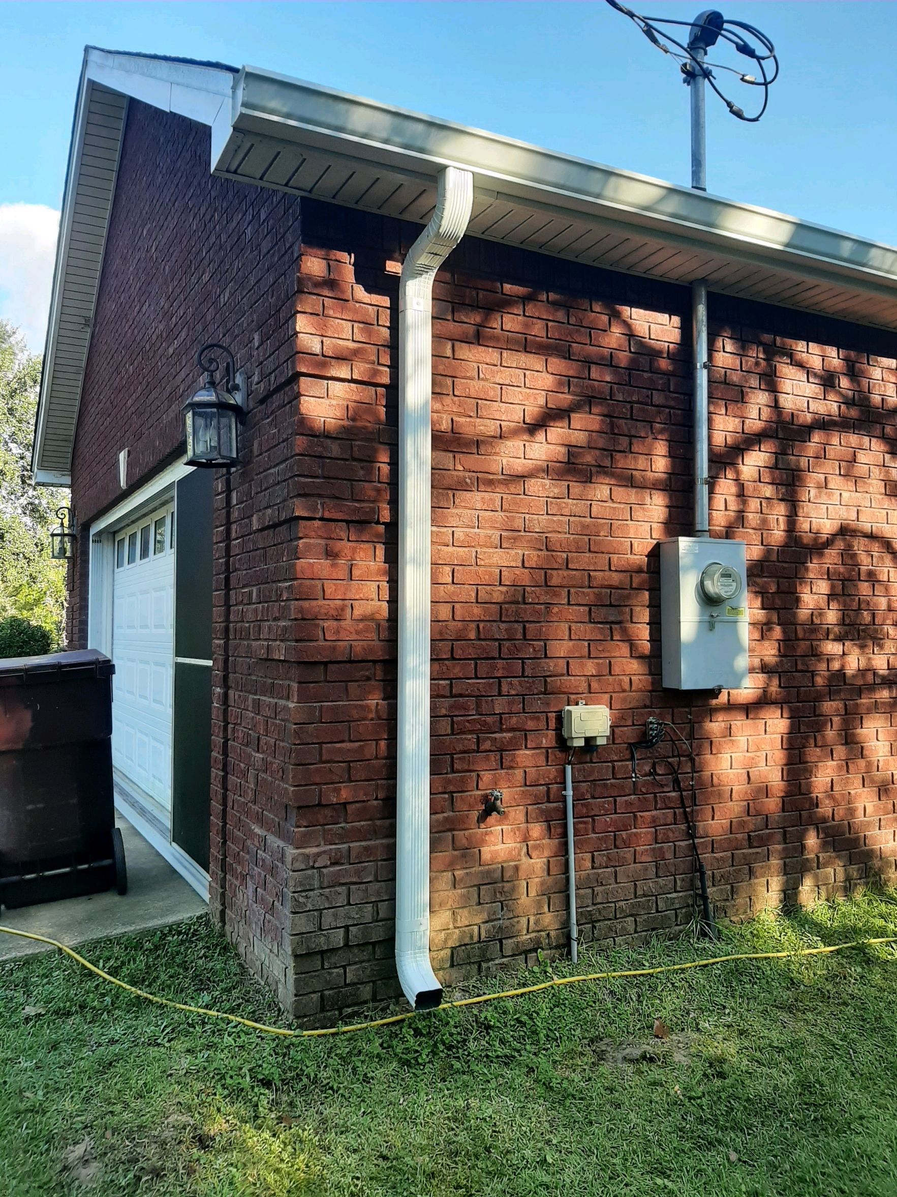 Gutter Installation using White K-Style Seamless Gutters by Gutter Professors