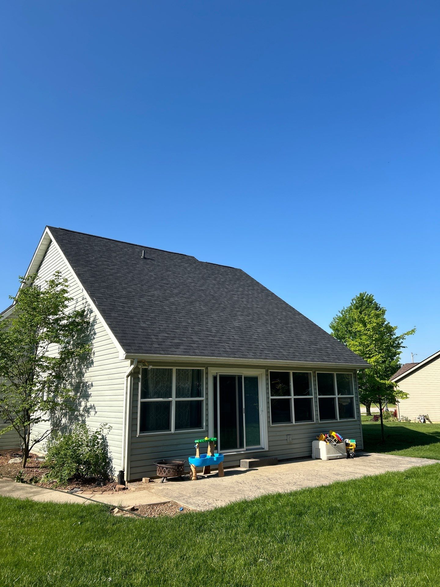 Exterior Installation using Onyx Black Durations and White Siding by WIW Enterprises Inc