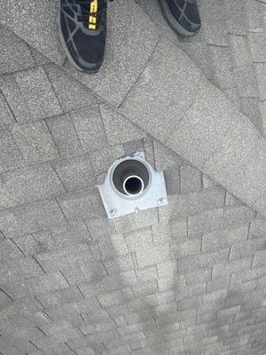 Vent pipe flashing on an architectural asphalt shingle roof