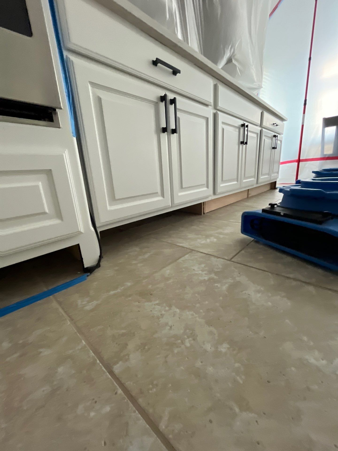 Kitchen Remodel using Water mitigation equipment by L&T General Contractors and Restoration INC
