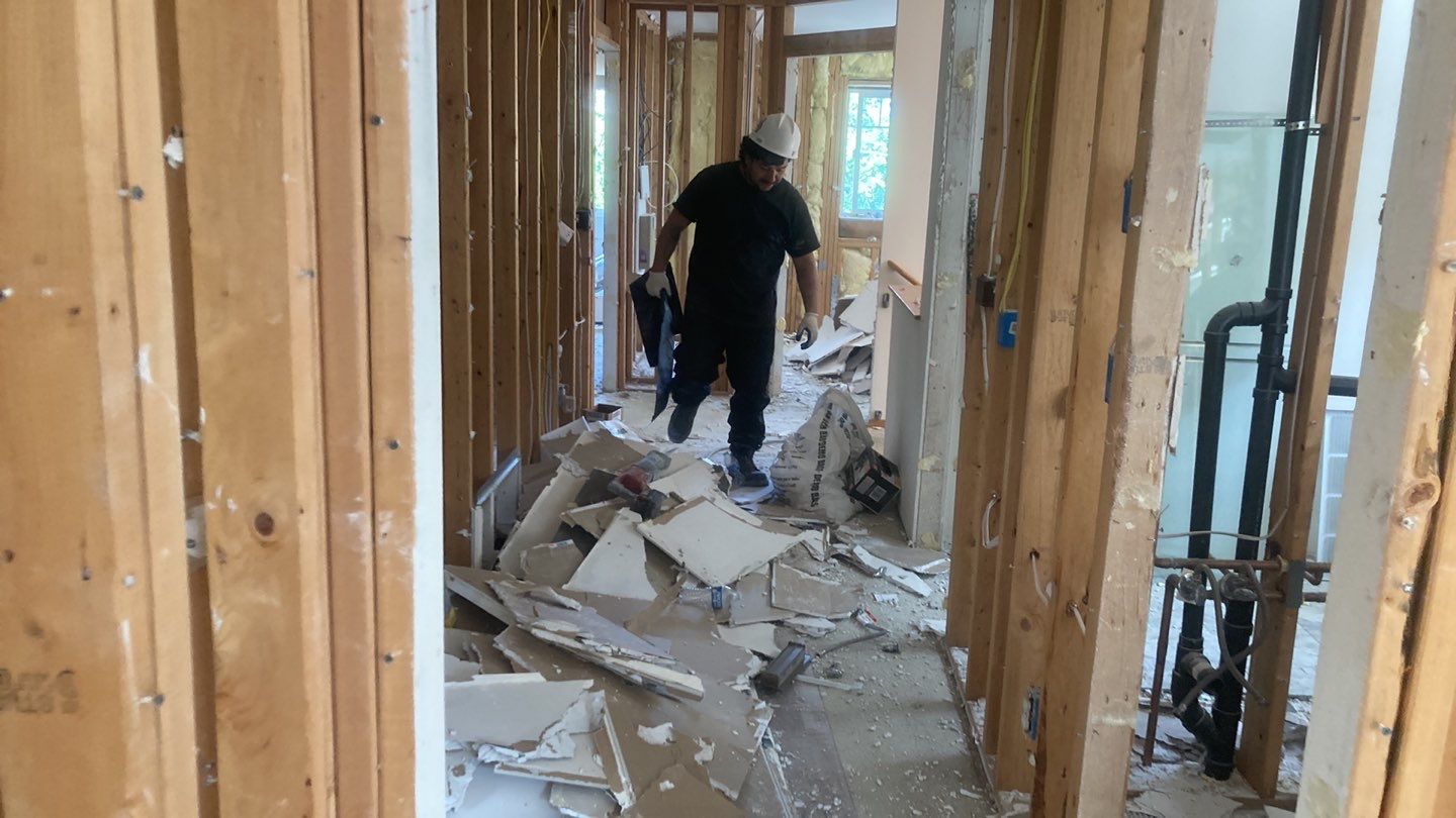 Roof tear-off and interior strip-out by Sledge Seattle