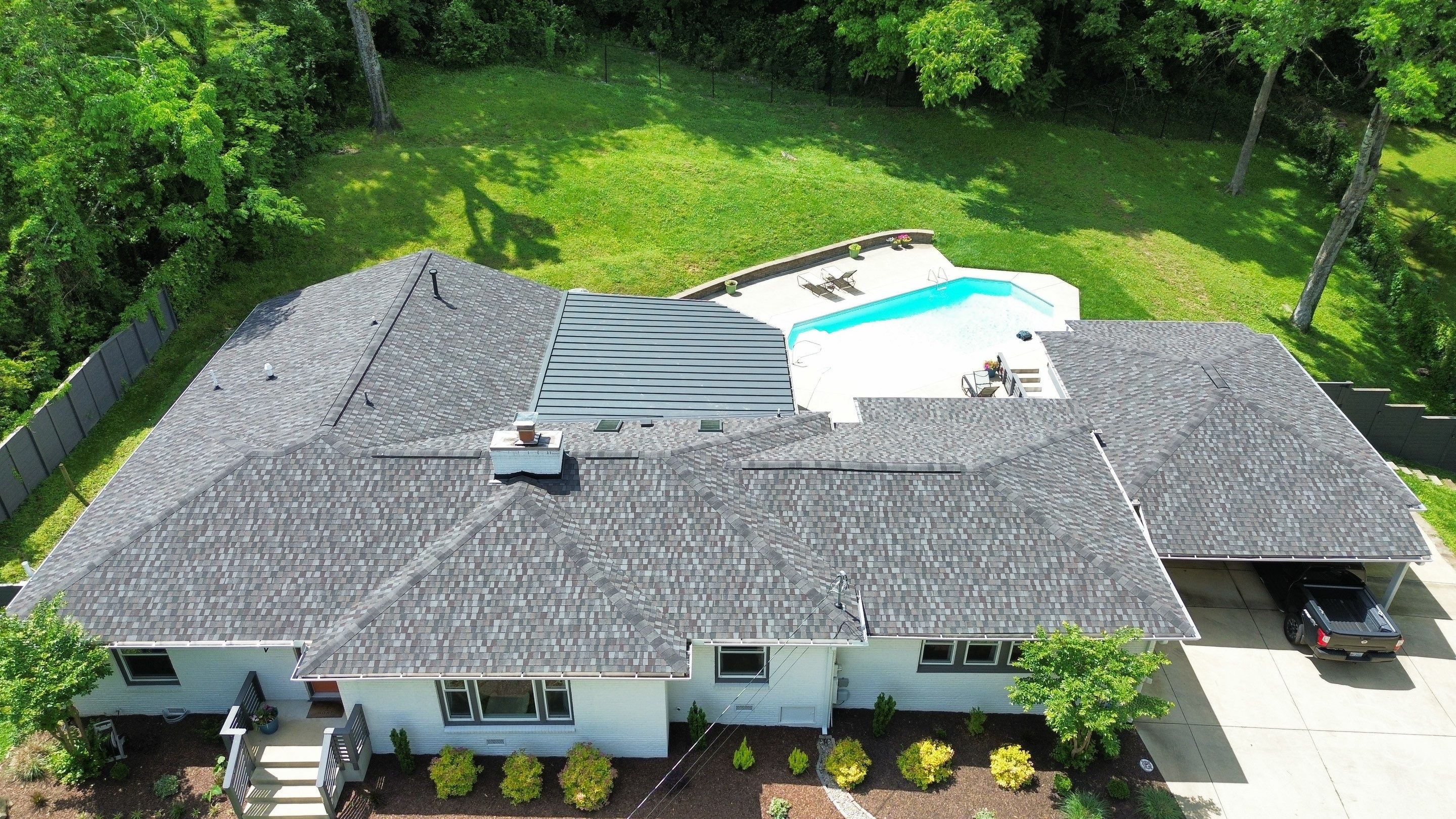 Residential Roofing Installation using GAF Timberline HDZ and Standing Seam Metal by Undersun Roofing 