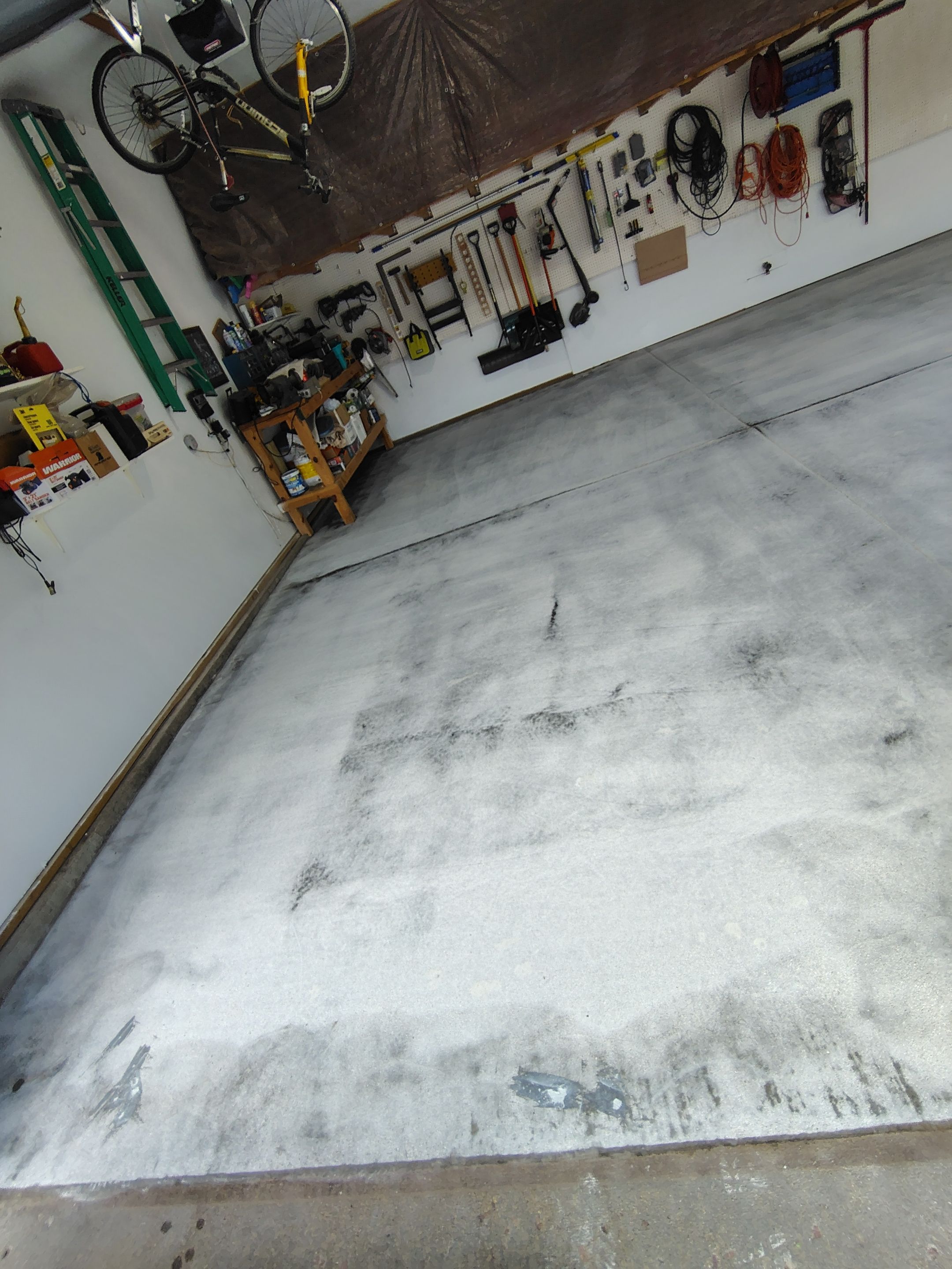 Durable Garage Floor Coating in Brandon by Select Painting, Coatings & Garage Cabinets