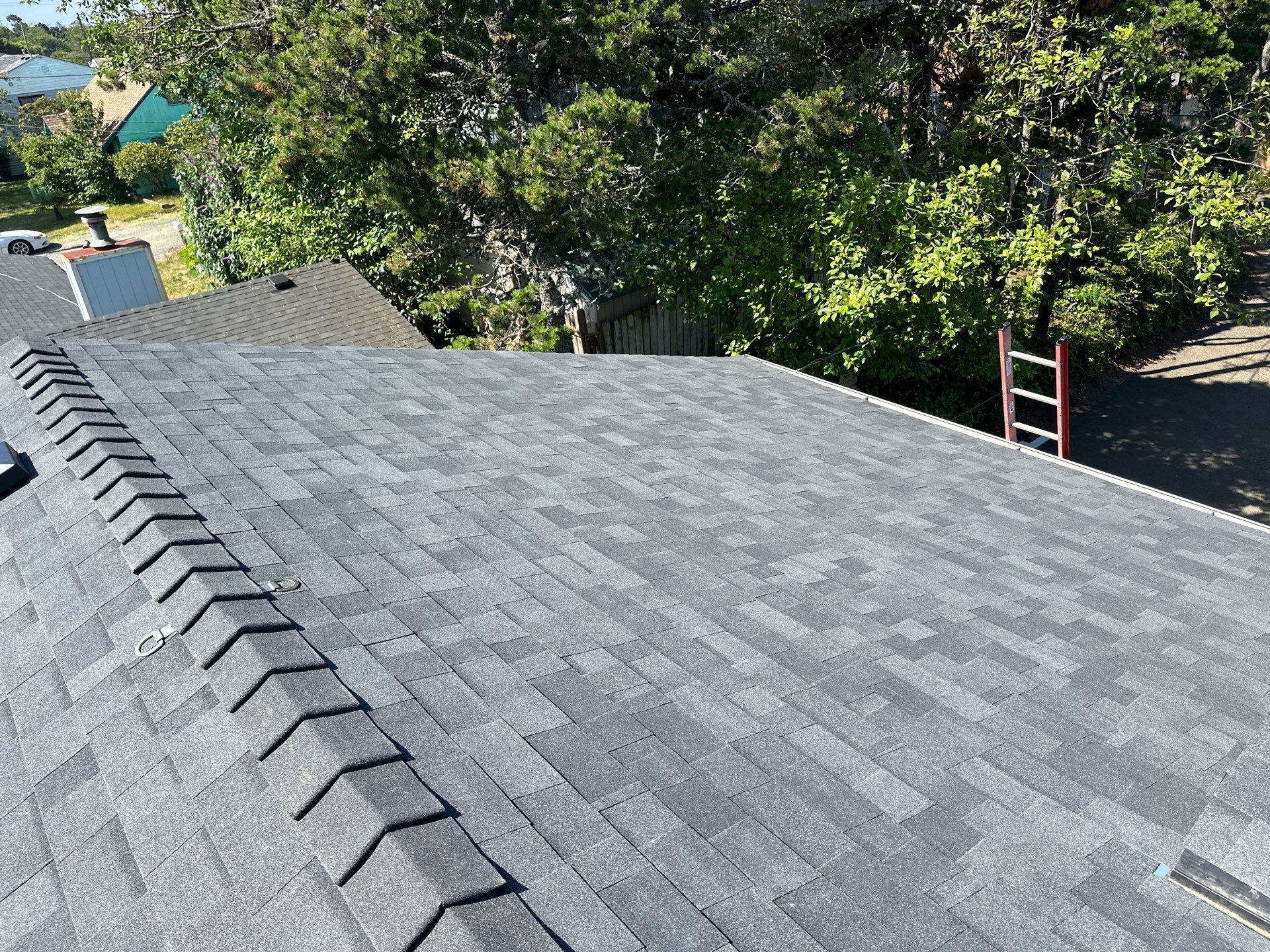 Residential Roofing Installation using Malarkey Highlander (Color: Midnight Black) by Orezona Building & Roofing Company, Inc.