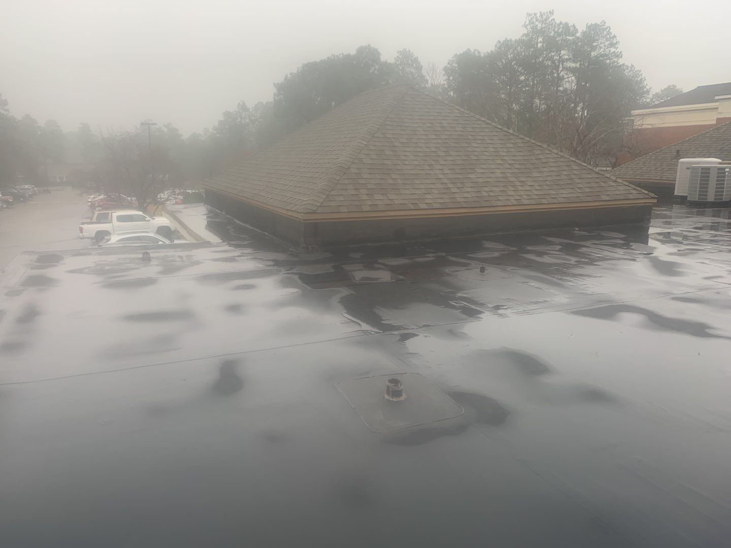 Re Roof (TPO) by American Roofing NC