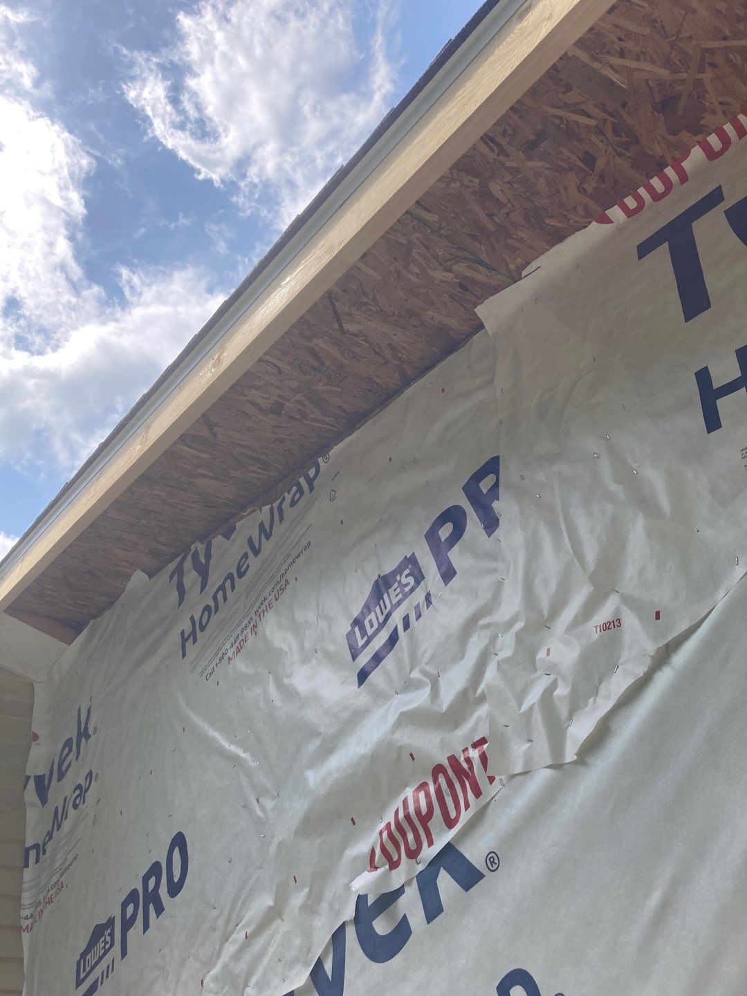 Gutter Installation using 5" Seamless Aluminum Gutters by Absolute Roofing and Construction