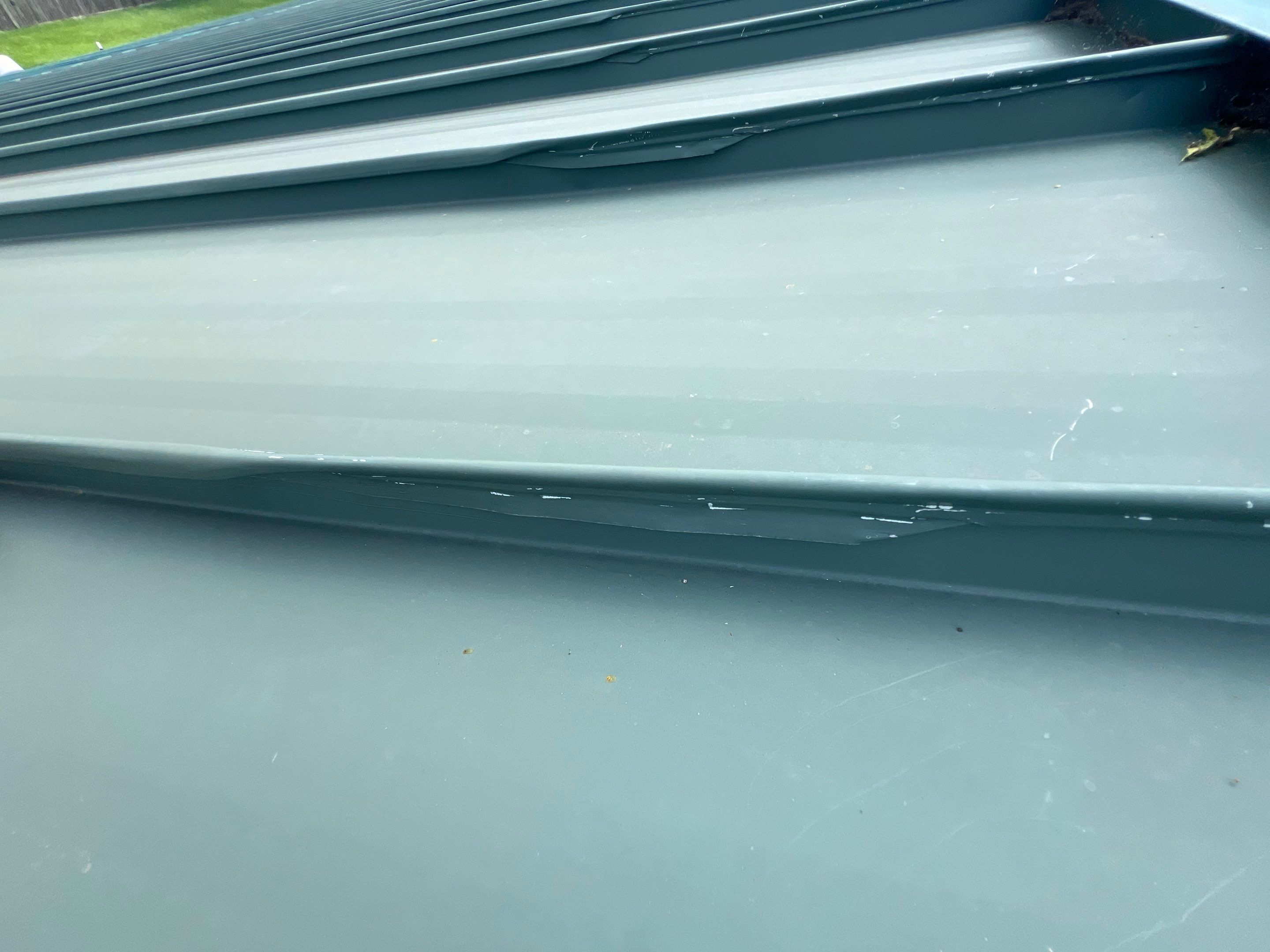 Hail Damage using Metal by Roof Repair Company