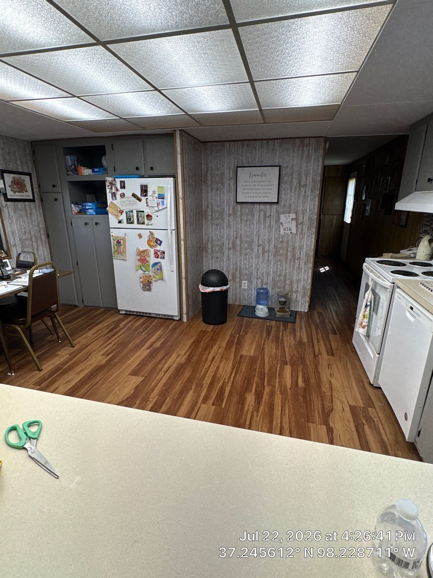 Kitchen Renovation Featuring Grey Cabinetry and Laminate Flooring in Attica by CompanyCam Sales Demo