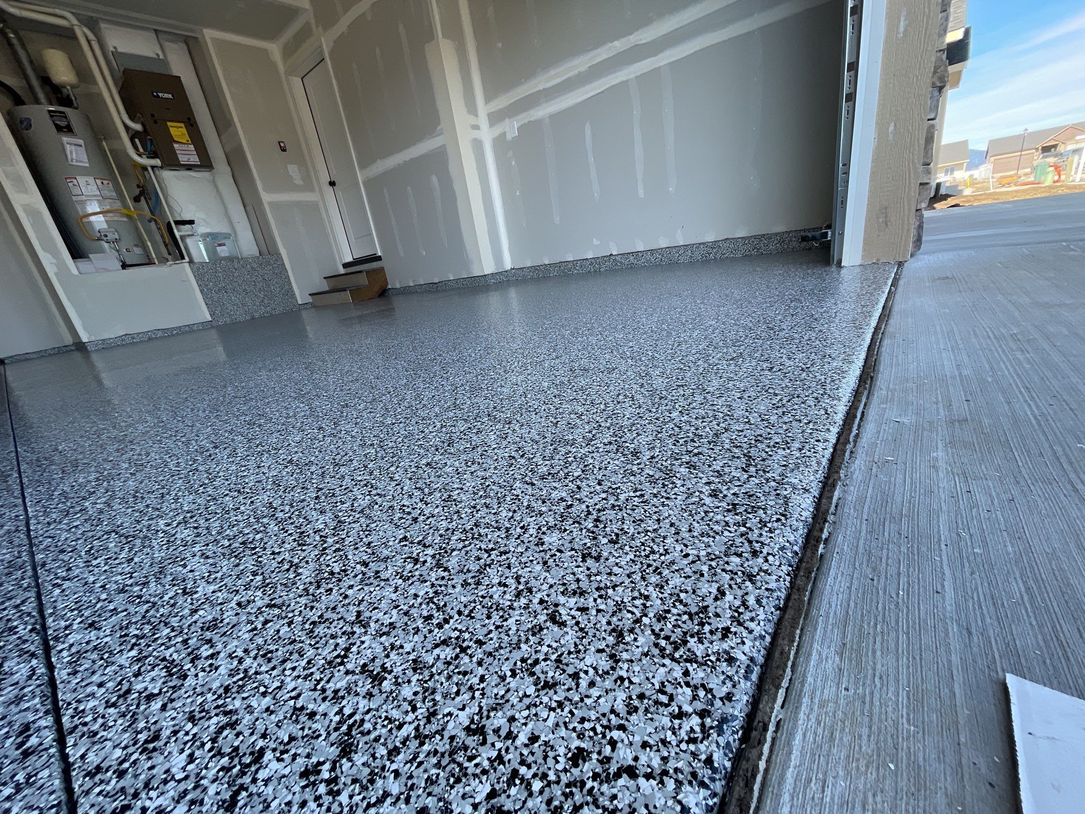 Garage Transformation using Domino by Croc Coatings, LLC