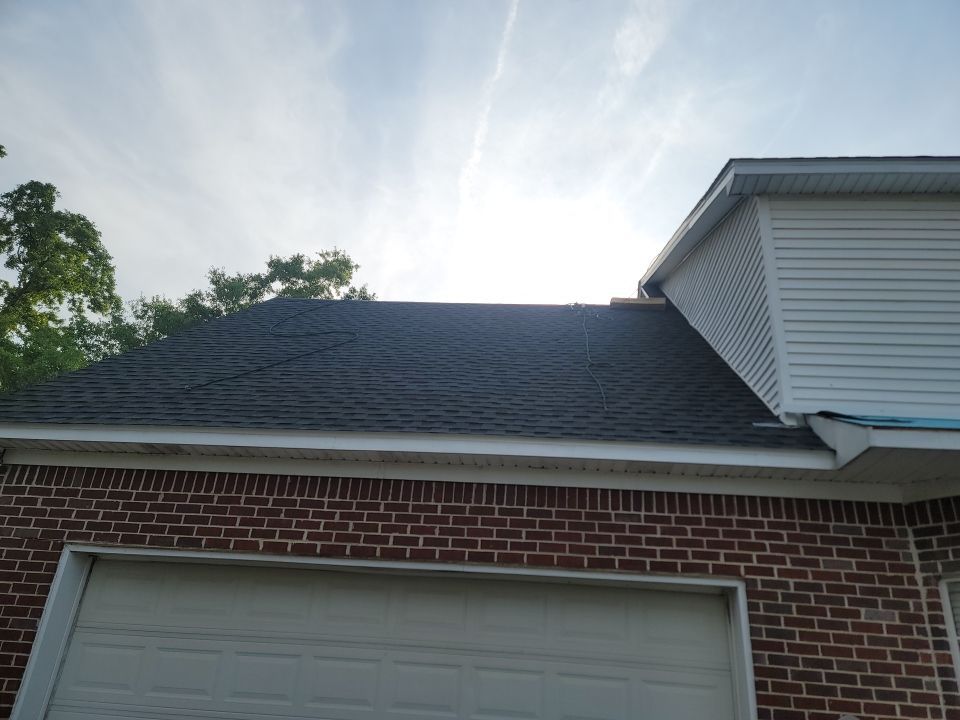 Residential Roofing Repair using Roof Replacement by American Roofing & Construction LLC