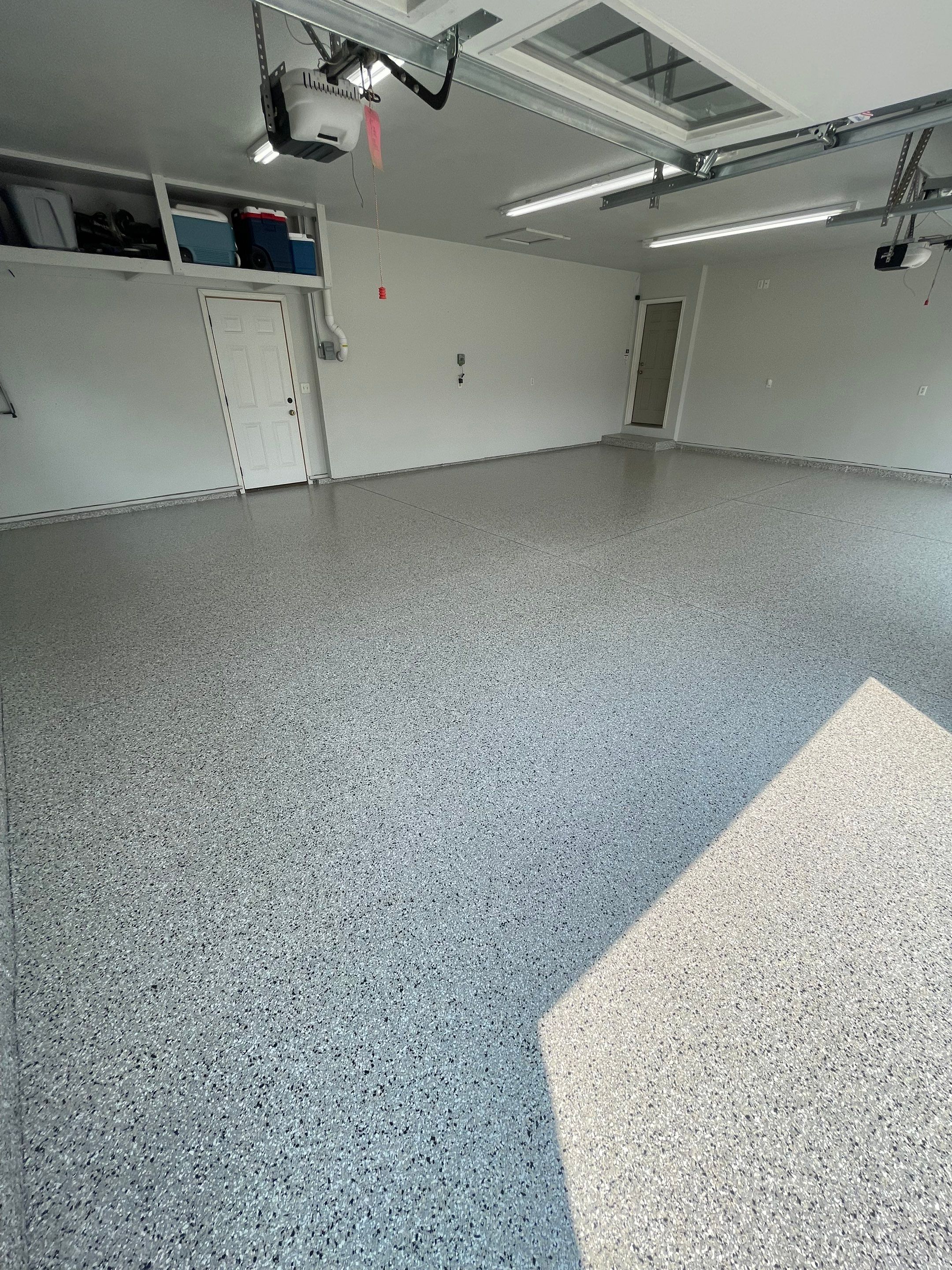 Multi-Car Garage Floor Coating and Crack Repair in Tea by Select Painting, Coatings & Garage Cabinets