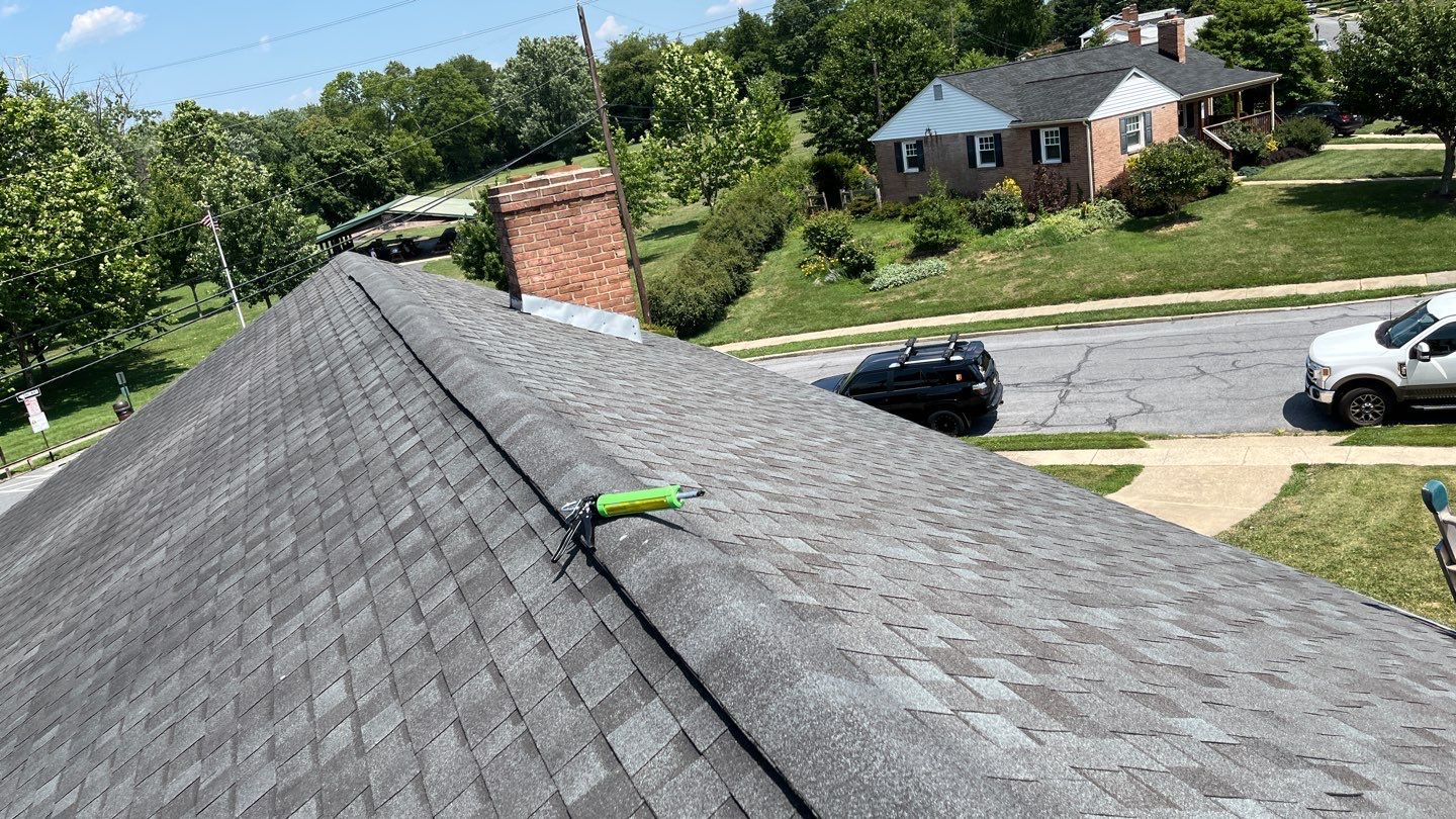 Residential Roofing Installation using Atlas Pinnacle Pristine Black Architectural Shingles by Frederick Roof Repair