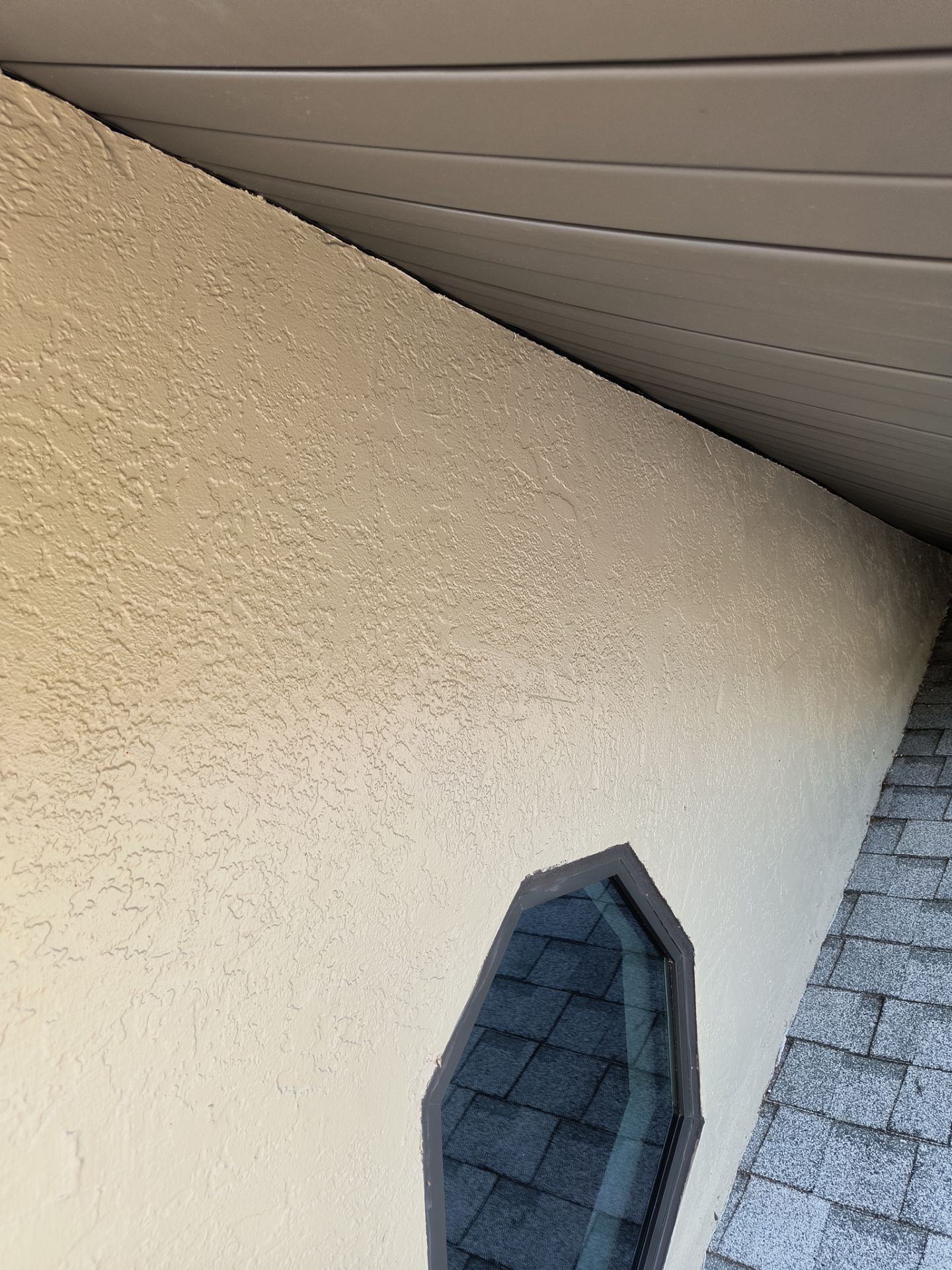 Black Seamless Gutters in Sarasota FL by Gutter Professors