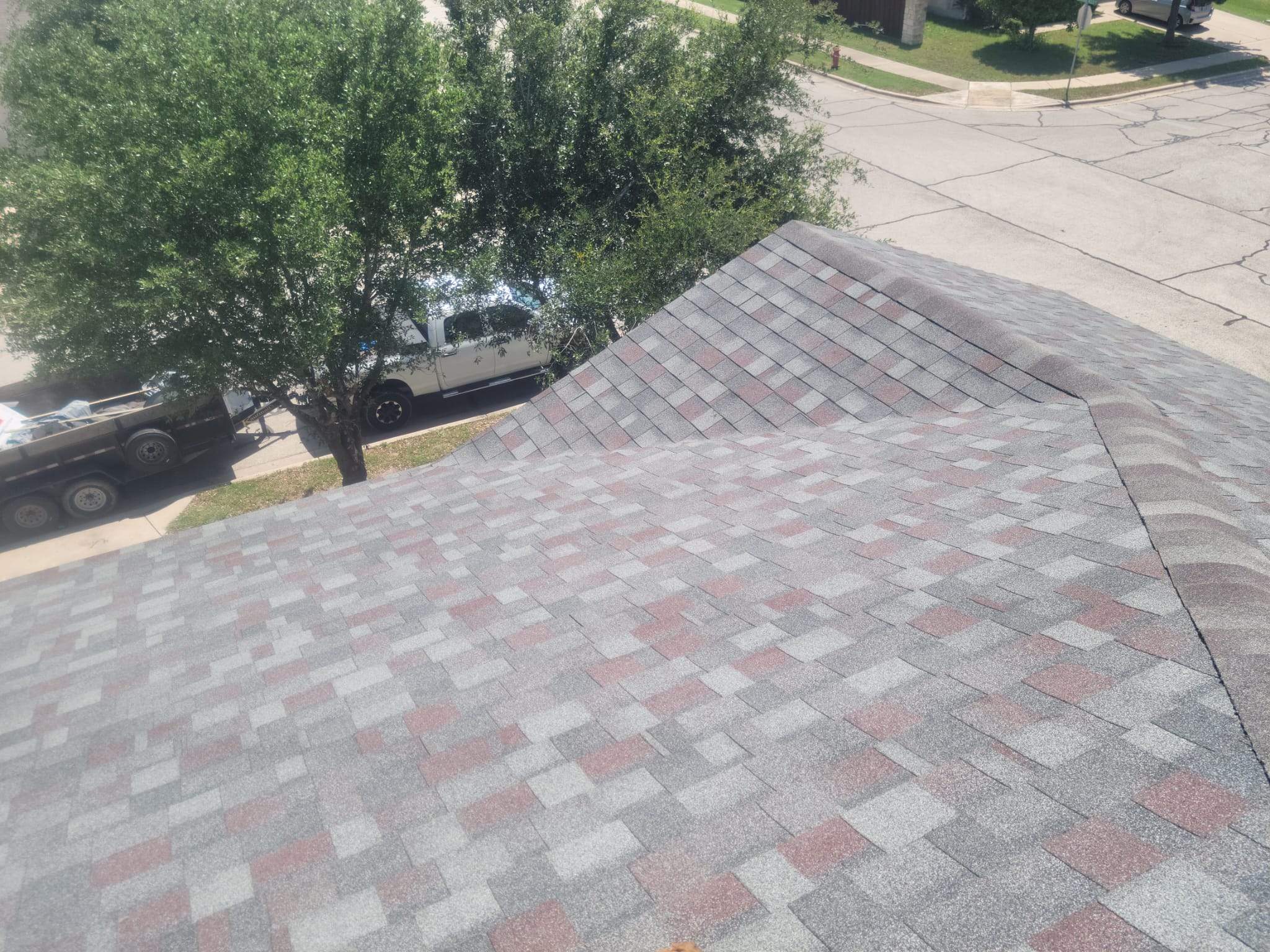 Residential Storm Damage Restoration and Roof Replacement in Manor by Caliber Restoration LLC