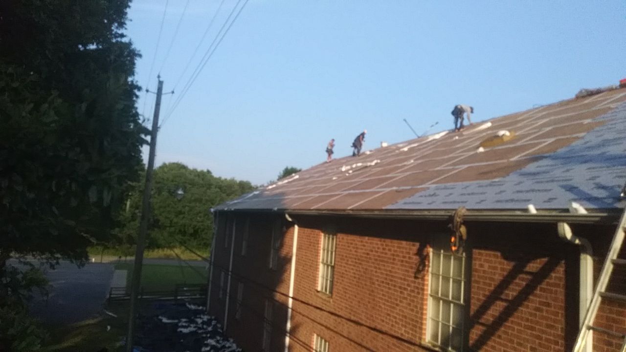 Residential Roofing Installation using Roof Replacement by American Roofing & Construction LLC