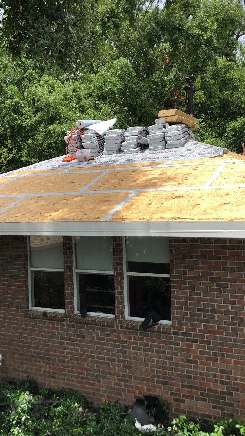 Residential Roofing Installation using Roof Replacement by American Roofing & Construction LLC