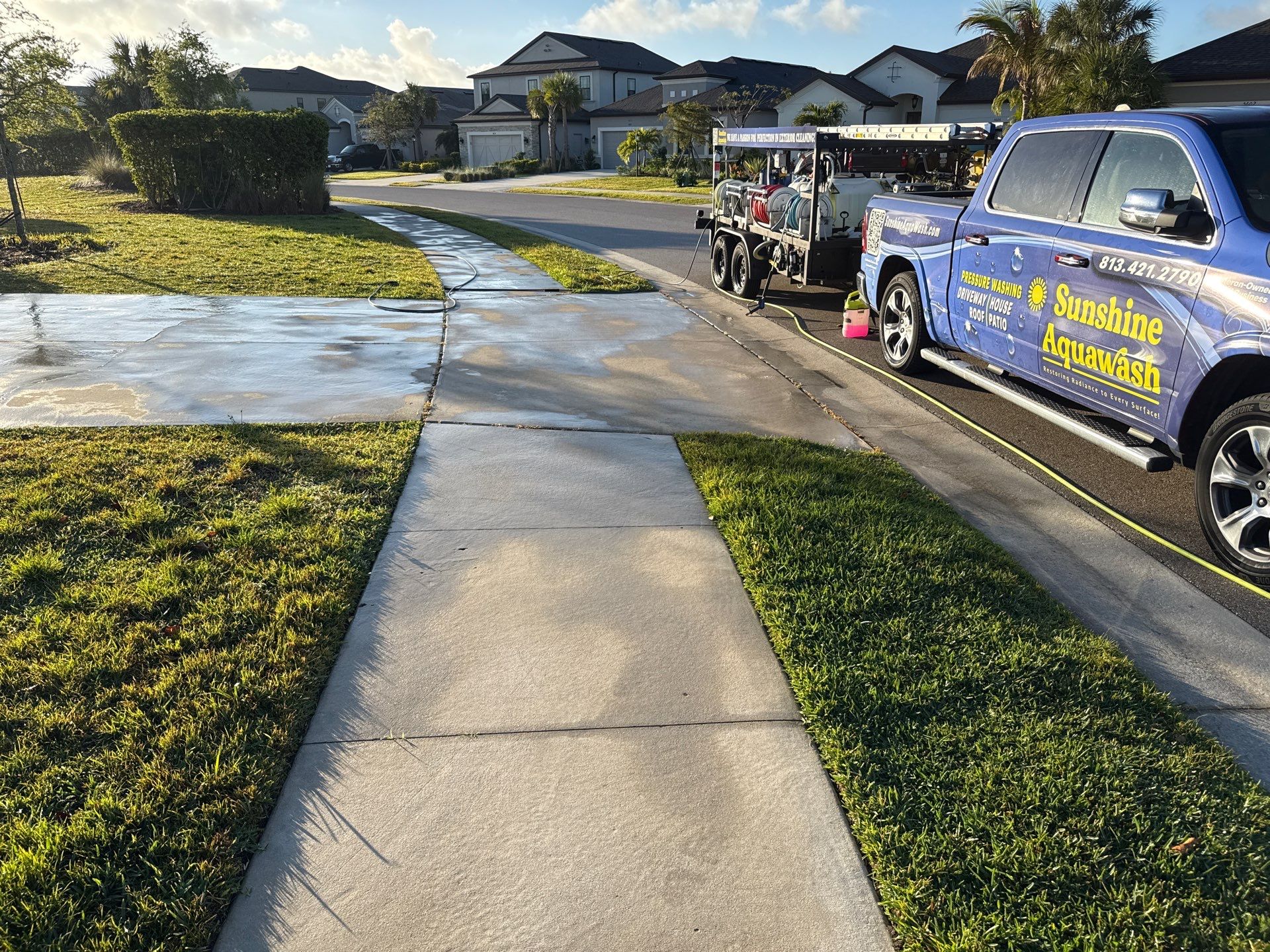 Oil Stain Removal & Concrete Cleaning – The Heights Community, Bradenton, FL by Sunshine AquaWash