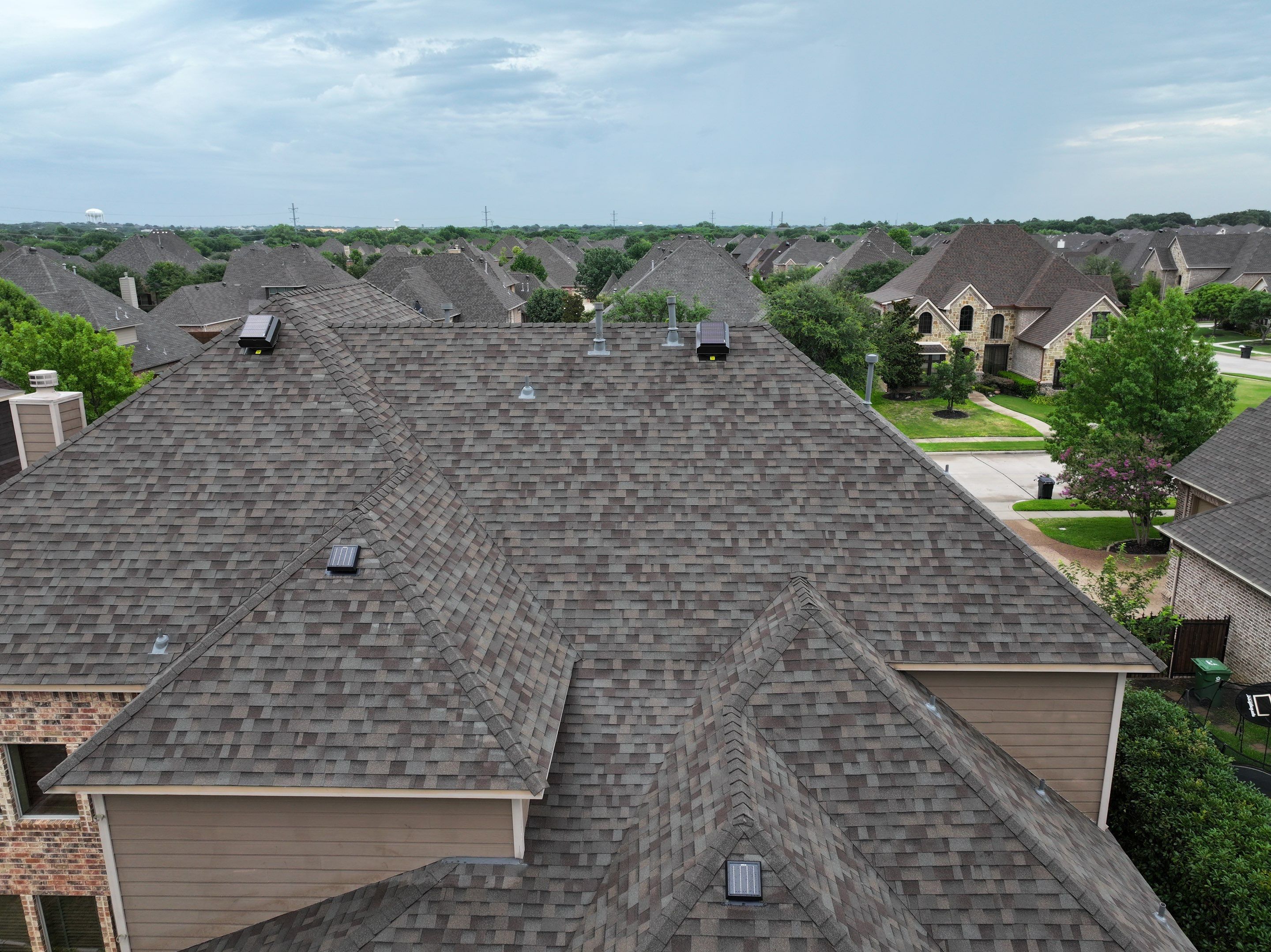 Installing Custom copper turret and Malarkey Vista Class 4 shingles Hail Damage Upgrade by Becker Roofing and Exteriors