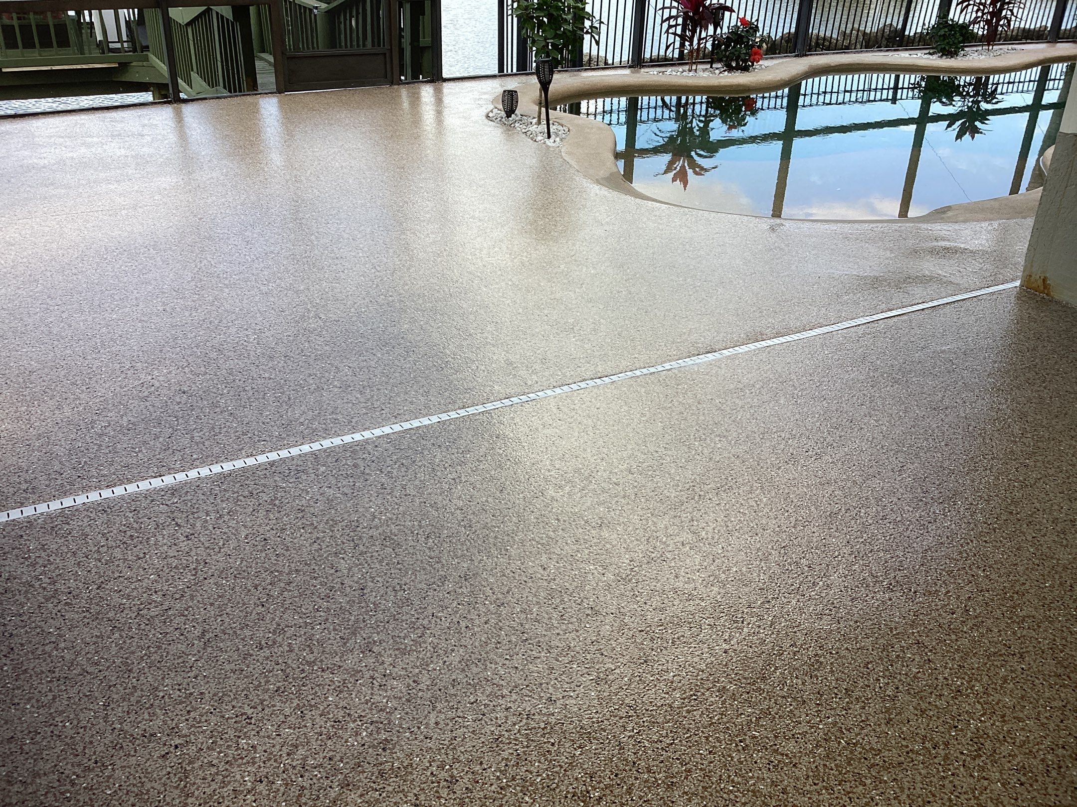 Pool Deck using Pecan by Amvet concrete coatings llc