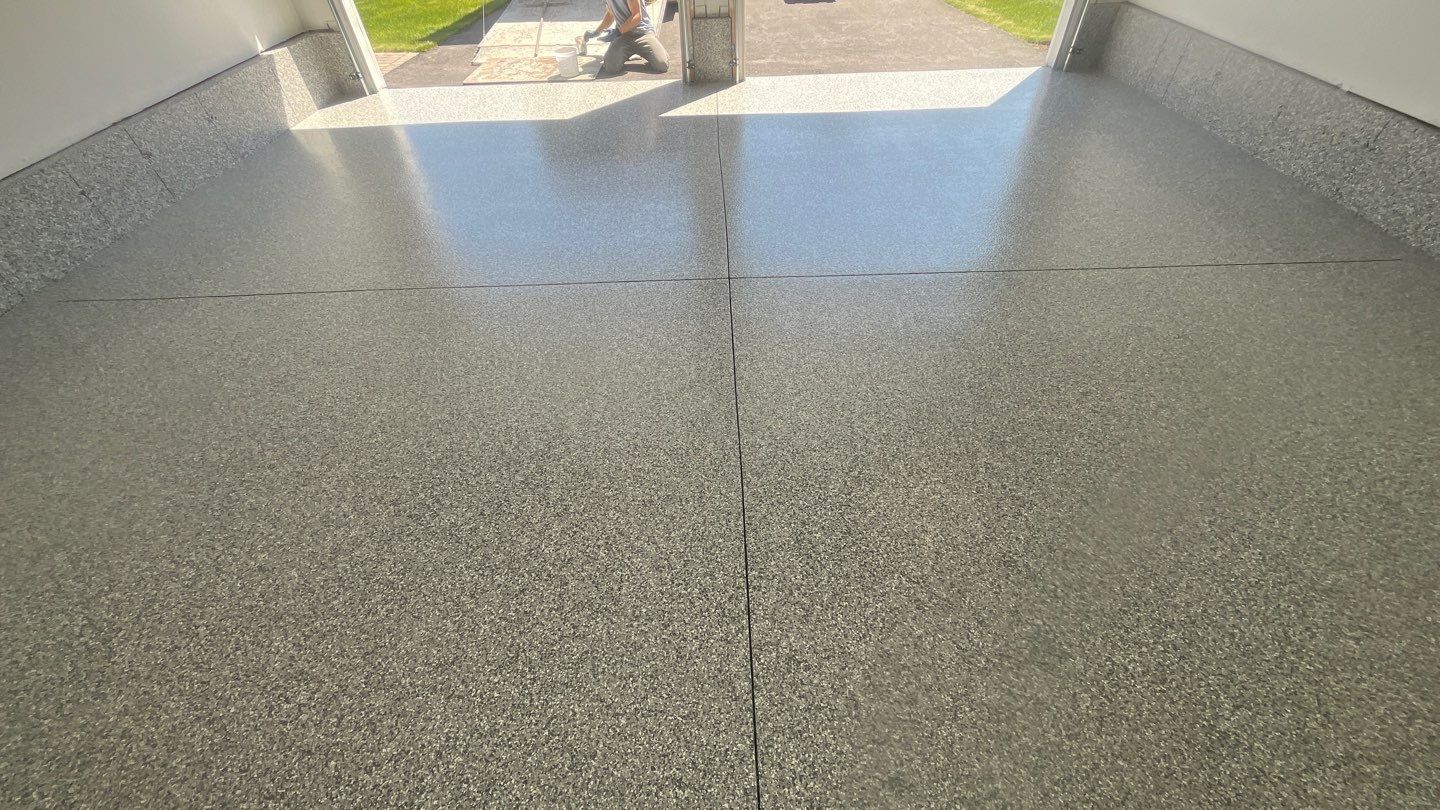 Garage in Londonderry, NH 03053 by Symphony Concrete Coatings