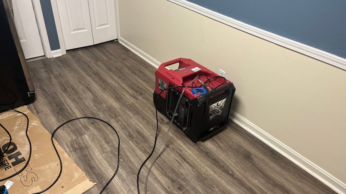 Interior Water Damage Affecting the Garage and Kitchen  by ANR Restoration