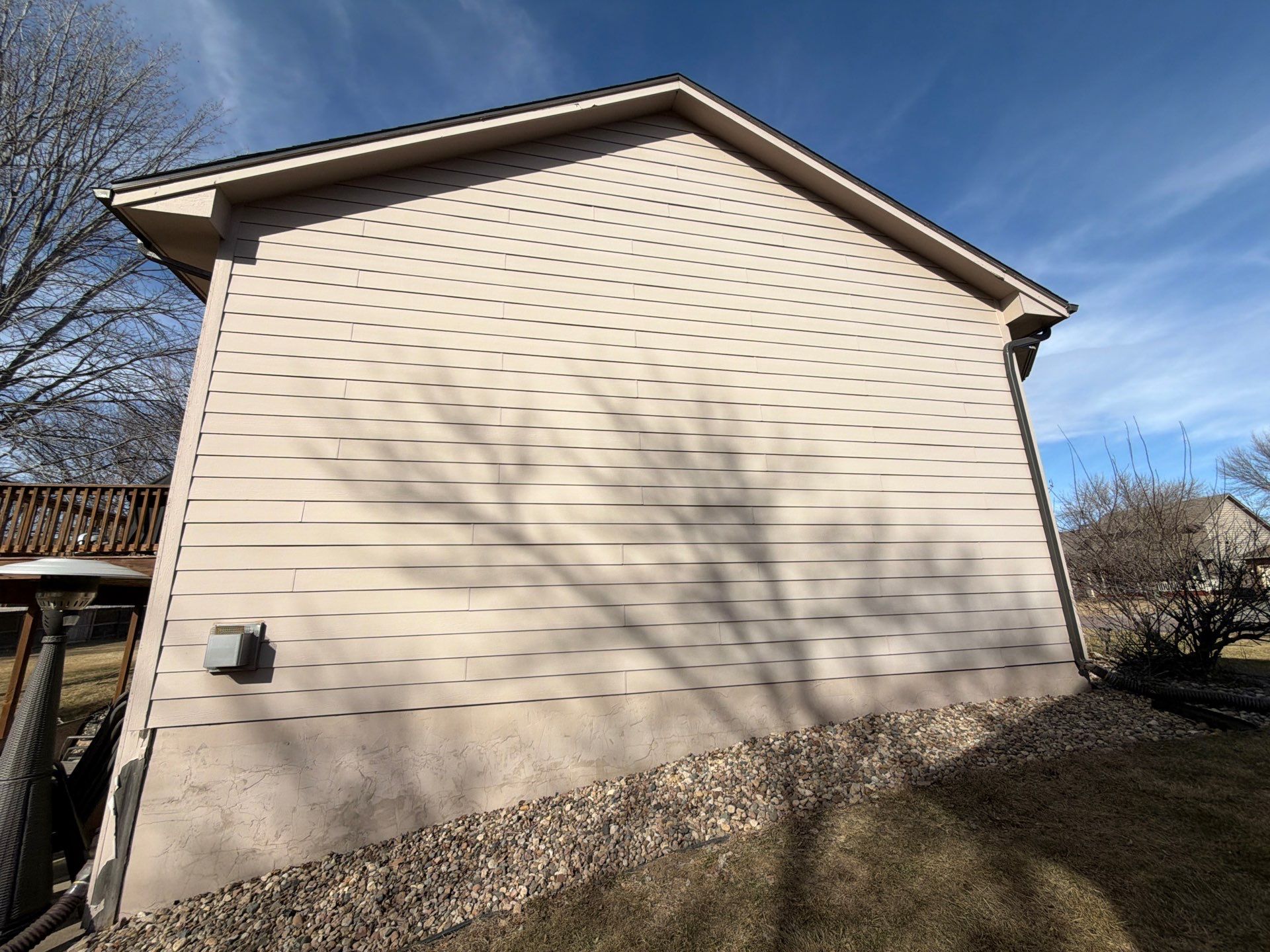 Residential Exterior Painting and Trim Restoration in Sioux Falls by Select Painting, Coatings & Garage Cabinets