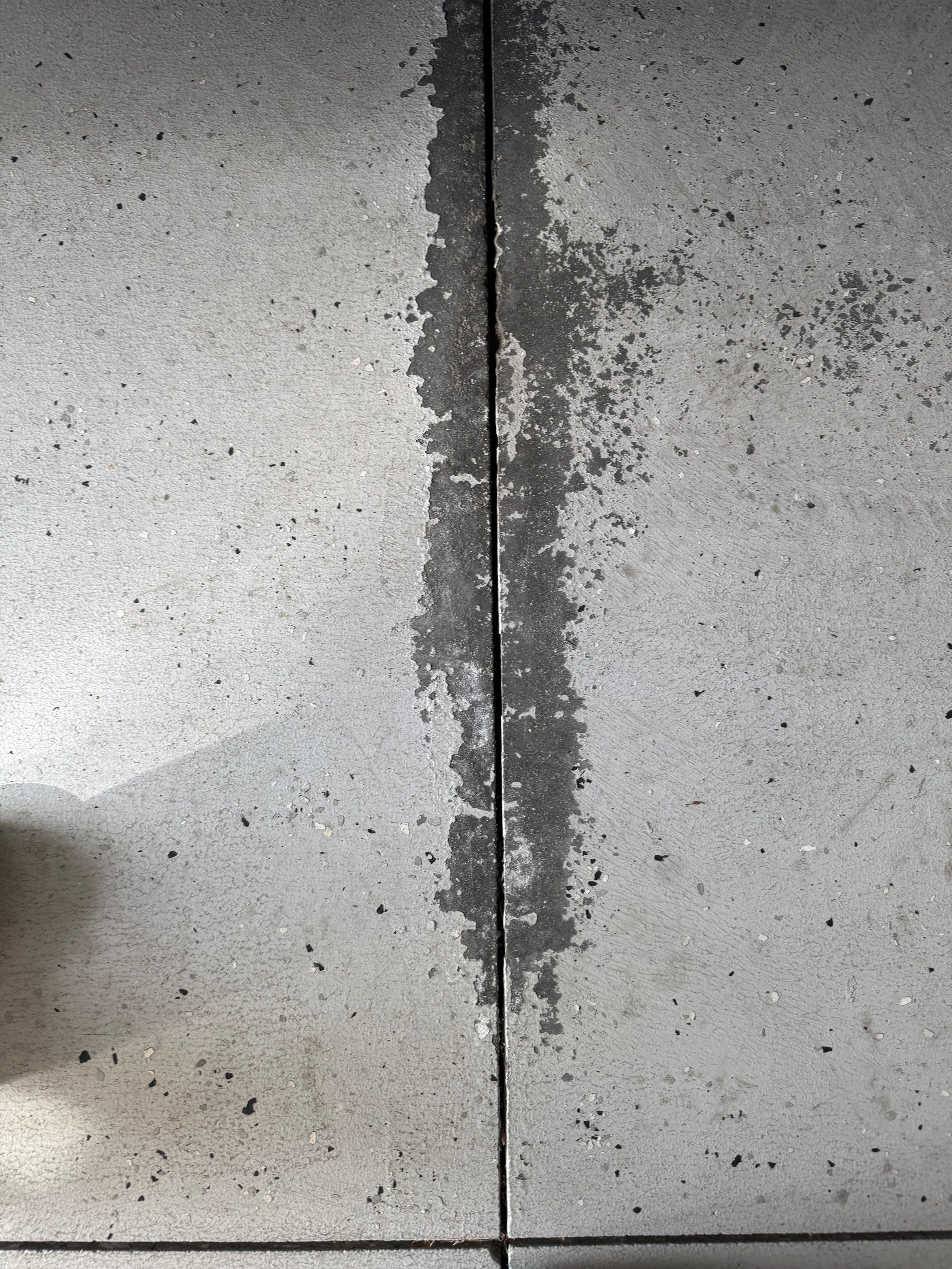 Garage in Londonderry, NH 03053 by Symphony Concrete Coatings