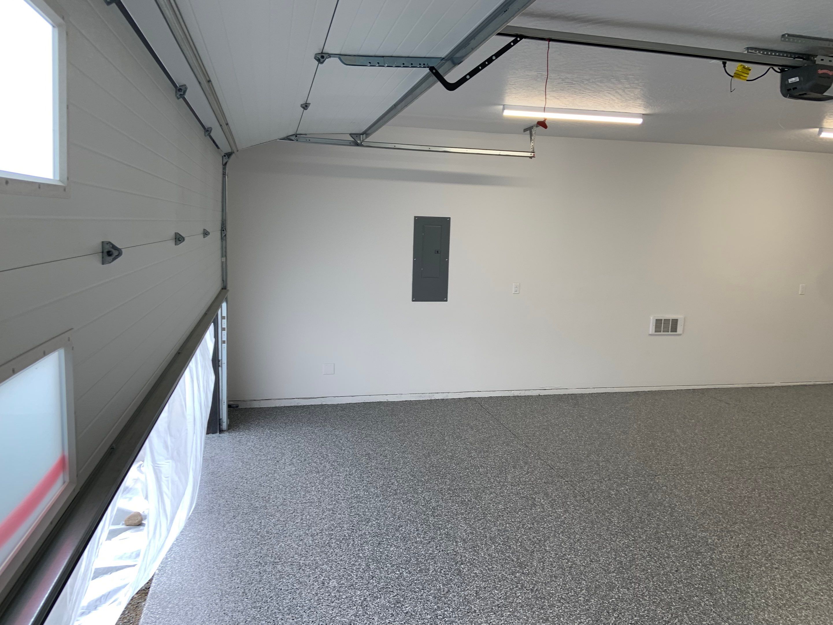 Garage Transformation using Smoke by Croc Coatings, LLC