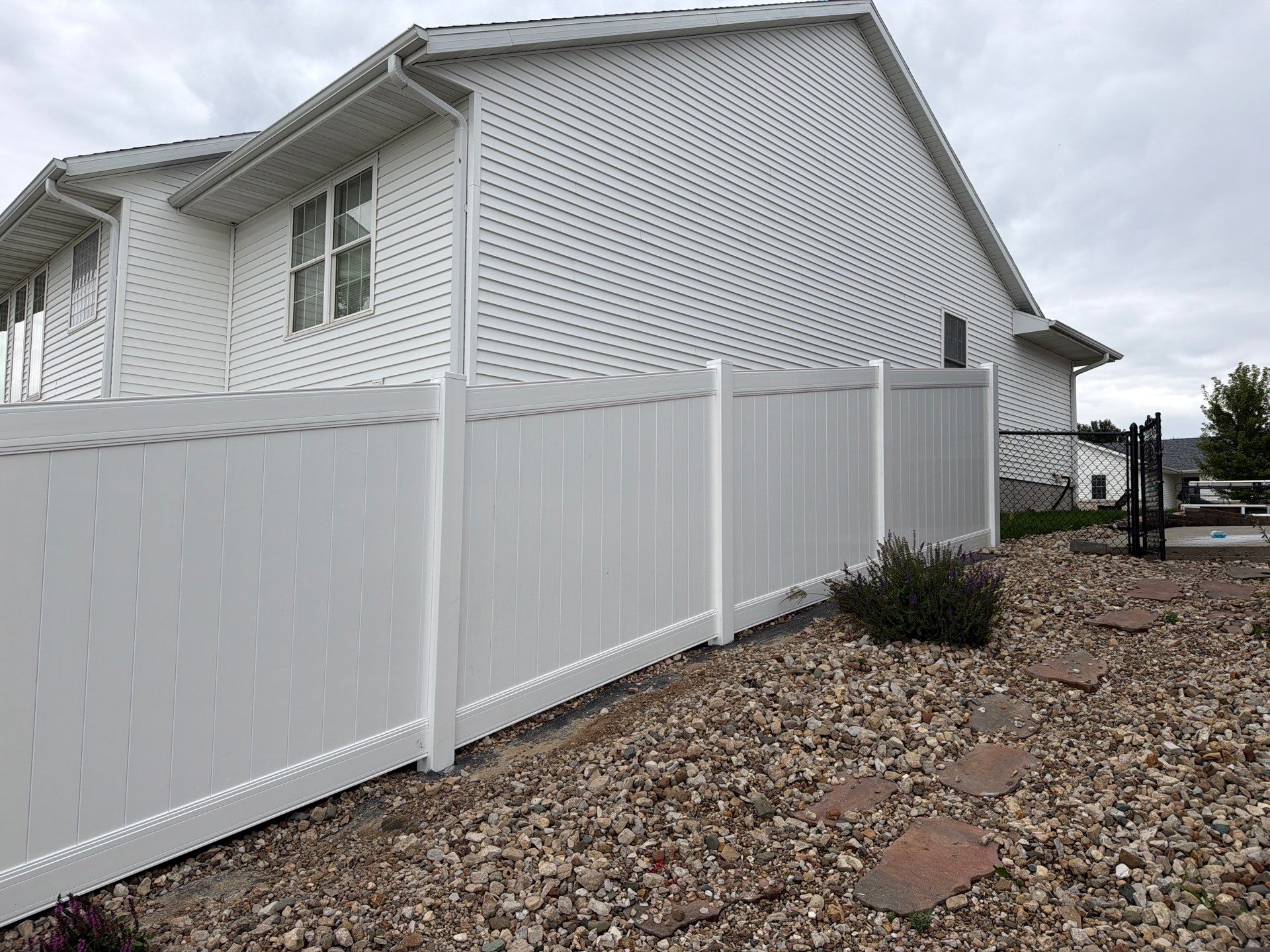 Residential Vinyl Privacy Fence Installation in Urbana by Perfect Picket Fence and Stain