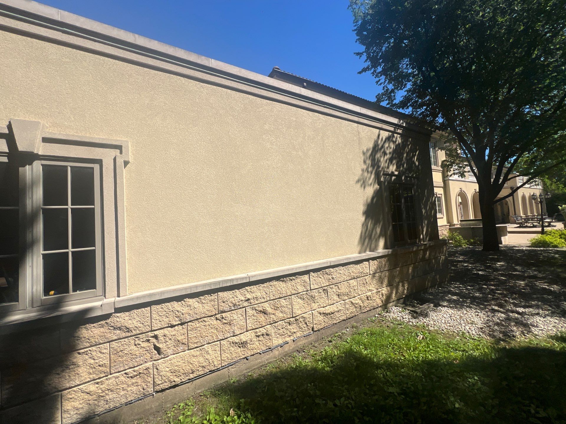 concrete cleaning using Algaecide, soft wash soap by Northern Power Washing LLC.