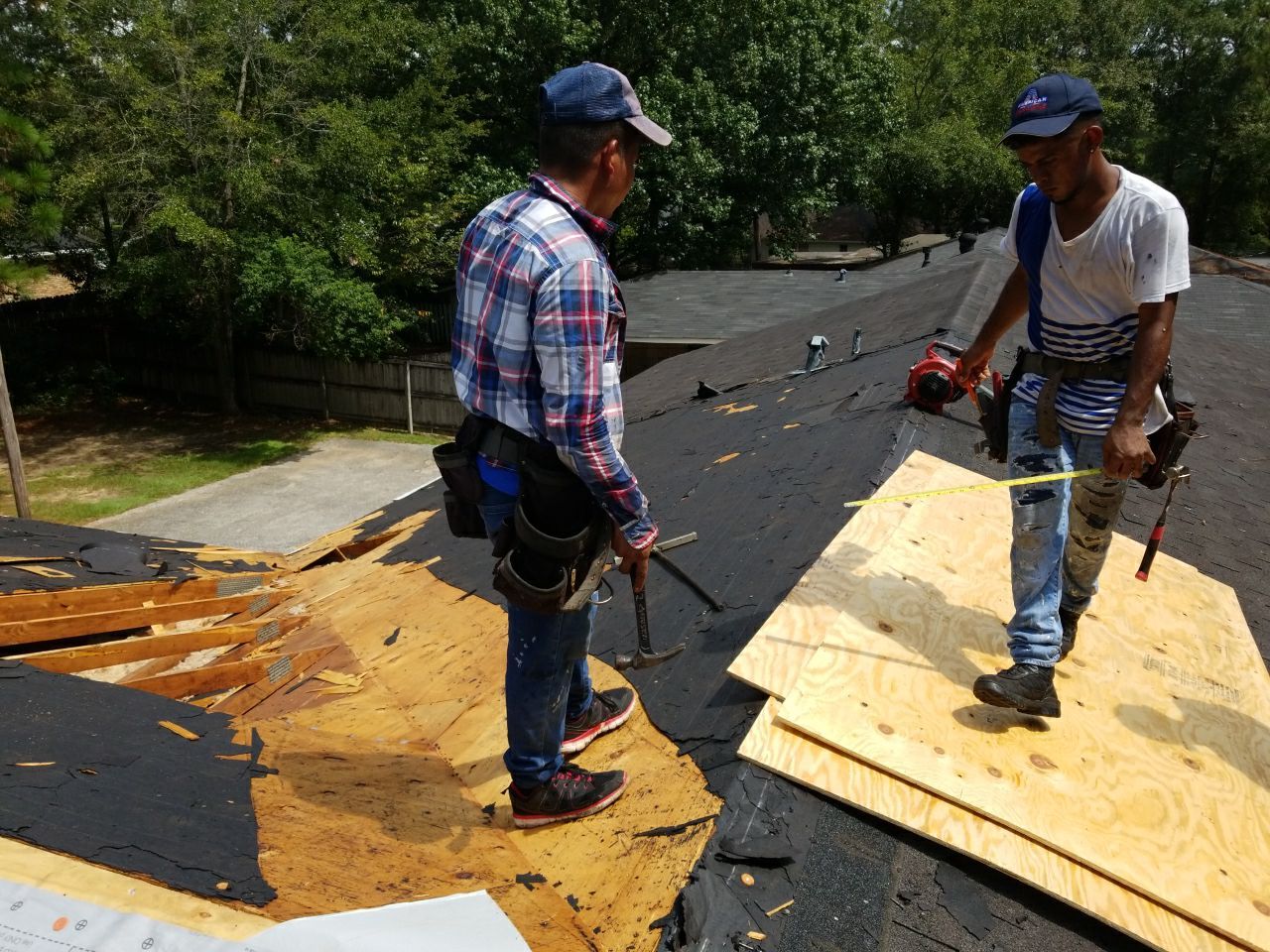 Residential Roofing Installation using Roof Replacement by American Roofing & Construction LLC