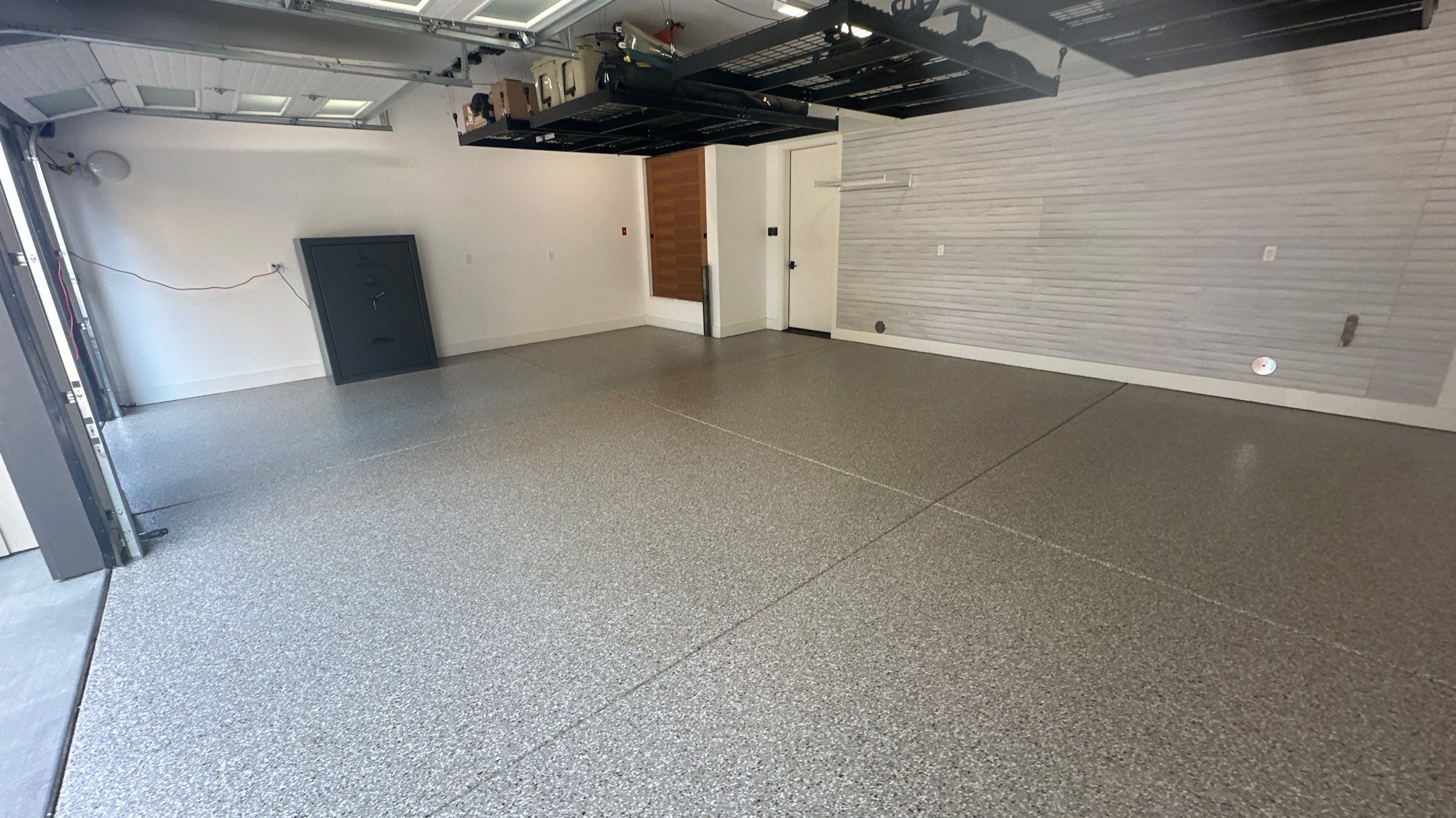 Garage Transformation using Pebble Beach by Croc Coatings, LLC