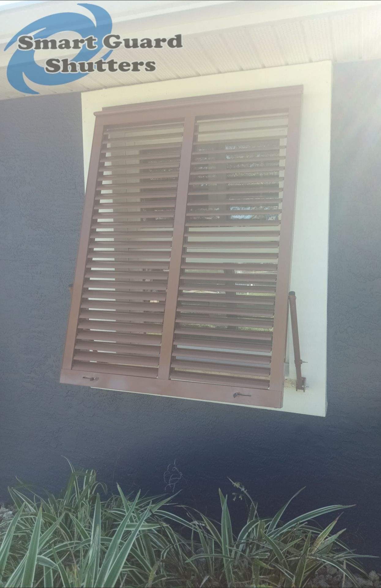 Impact Bahamas in Beige Brown by Smart Guard Shutters