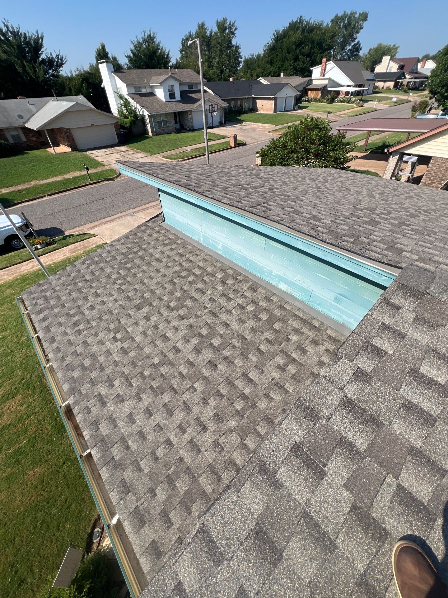 Roof Replacement and Gutter Installation in Oklahoma City, OK by McCann's Roofing and Construction