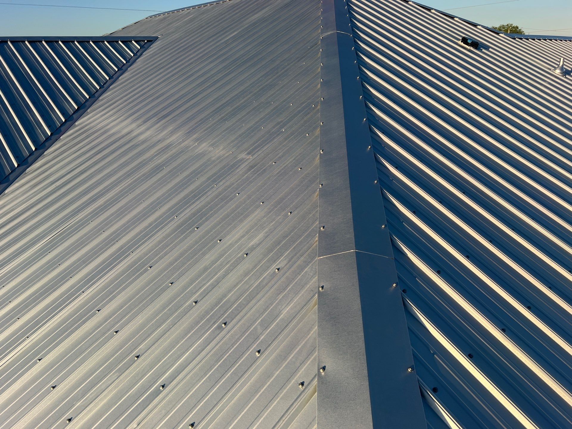 Residential Roofing Installation using Durabull Classic Rib Panel by Durabilis Roofing INC