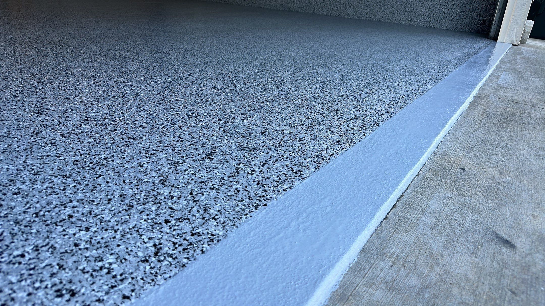 Sandy S. transformed her garage with a Banner Garage Floor and a cabinets by Banner Garage