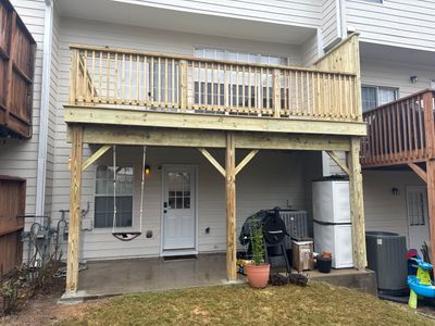 New Second-Story Pressure-Treated Wood Deck Installation in Atlanta