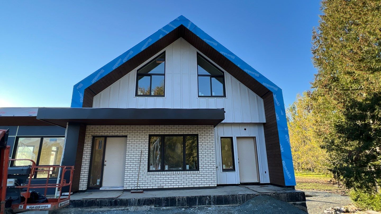 Residential Roofing Installation using multiple products by Top Notch Roofing Inc