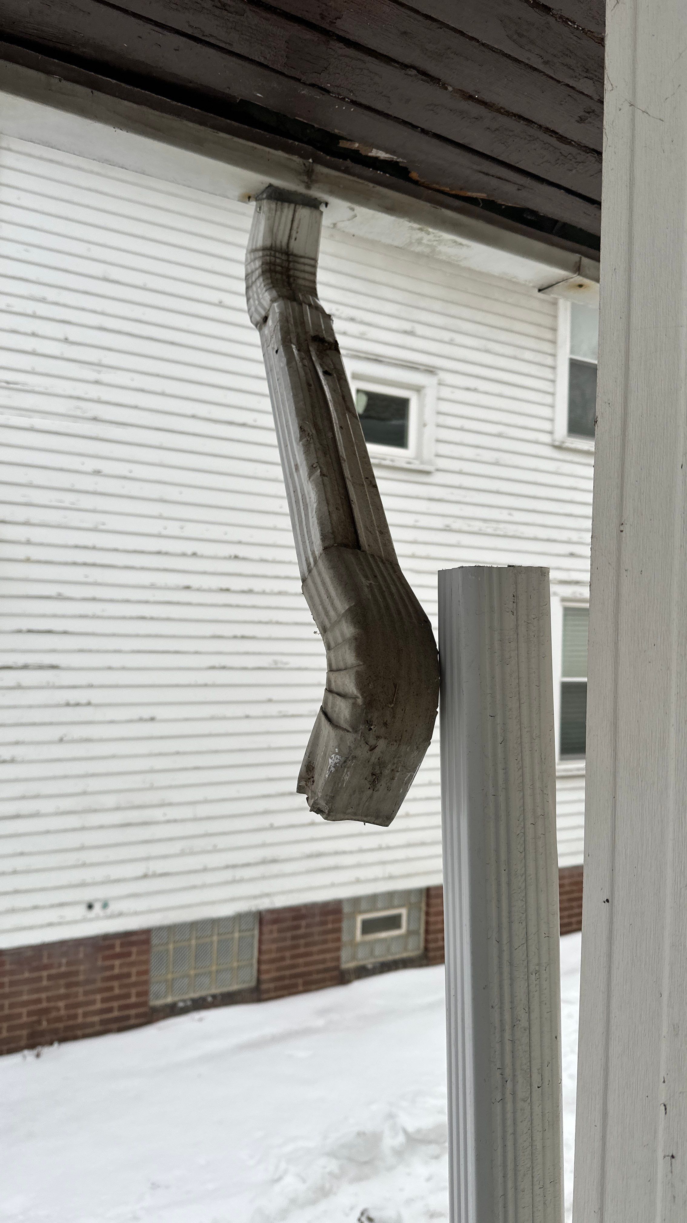 Downspout repair by Homestyle in Lakewood by Homestyle Home Improvements (HHI)