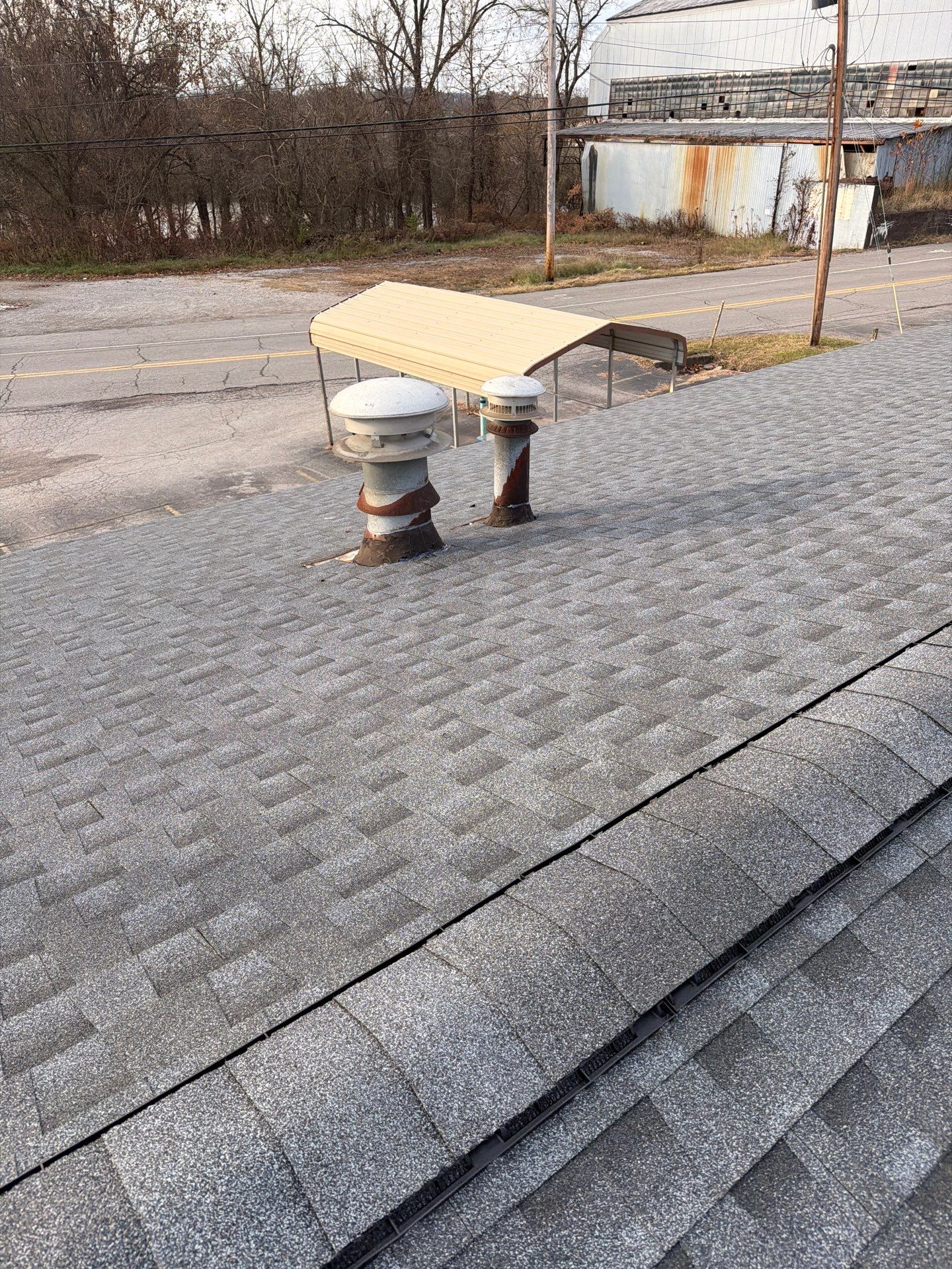 Commercial Roofing Installation using GAF Timberline HDZ Pewter Gray by Rainstoppers Roofing