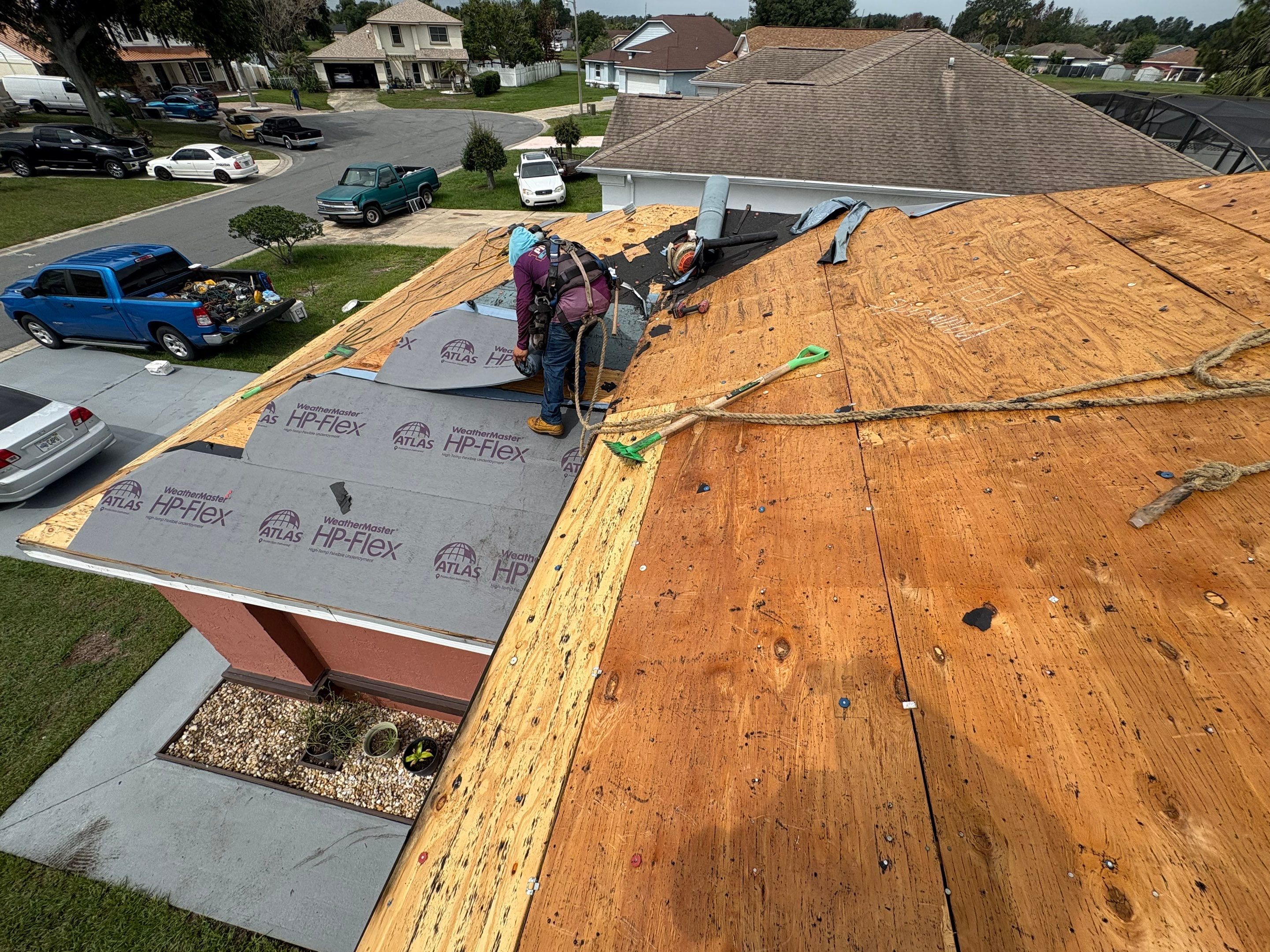 Residential Metal Roofing Installation and Gutter Replacement in Kissimmee by Pinnacle Roofing Group