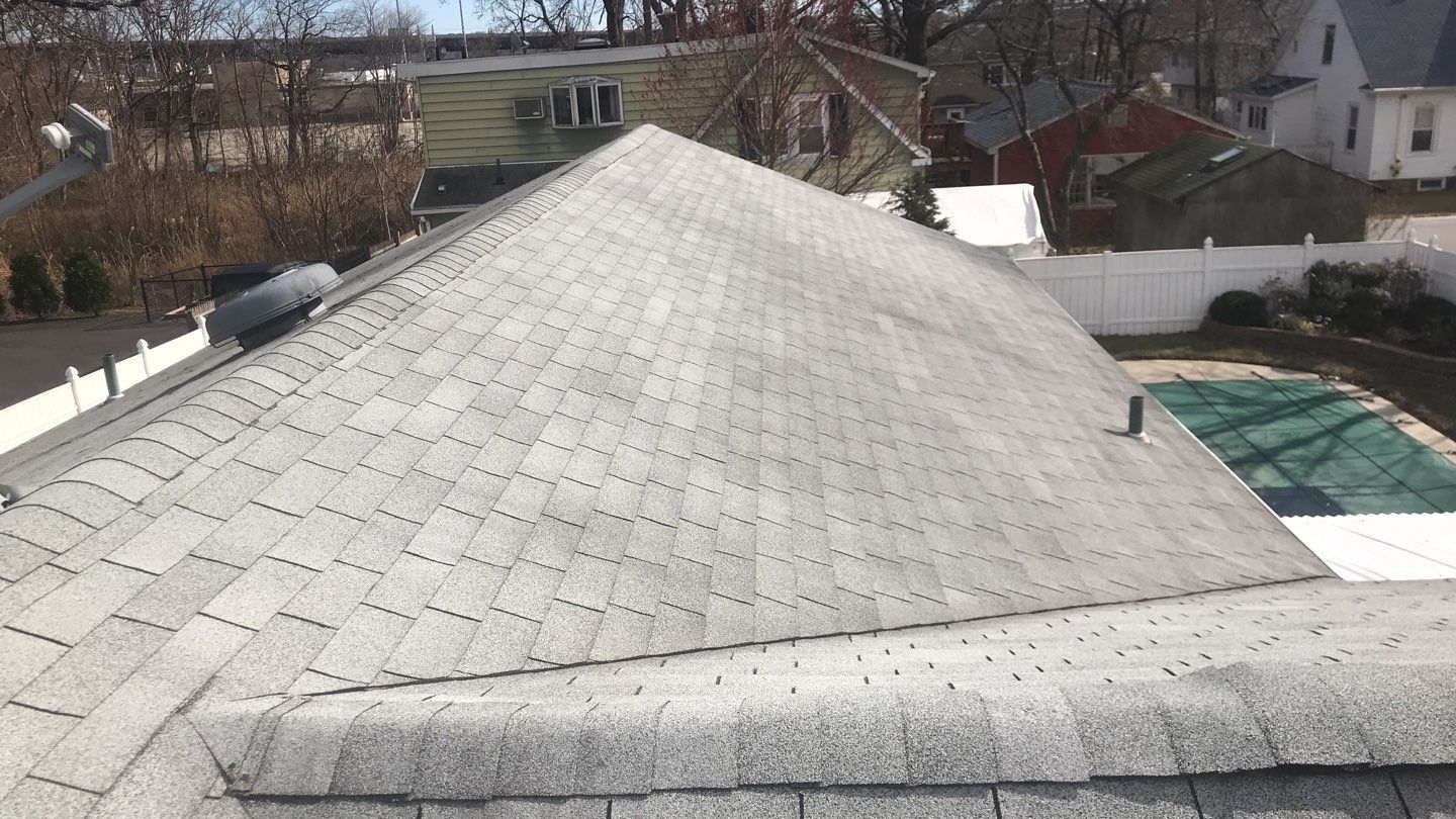 Residential Roofing Installation using Owens Corning Duration Slatestone Gray by A Plus Exterior