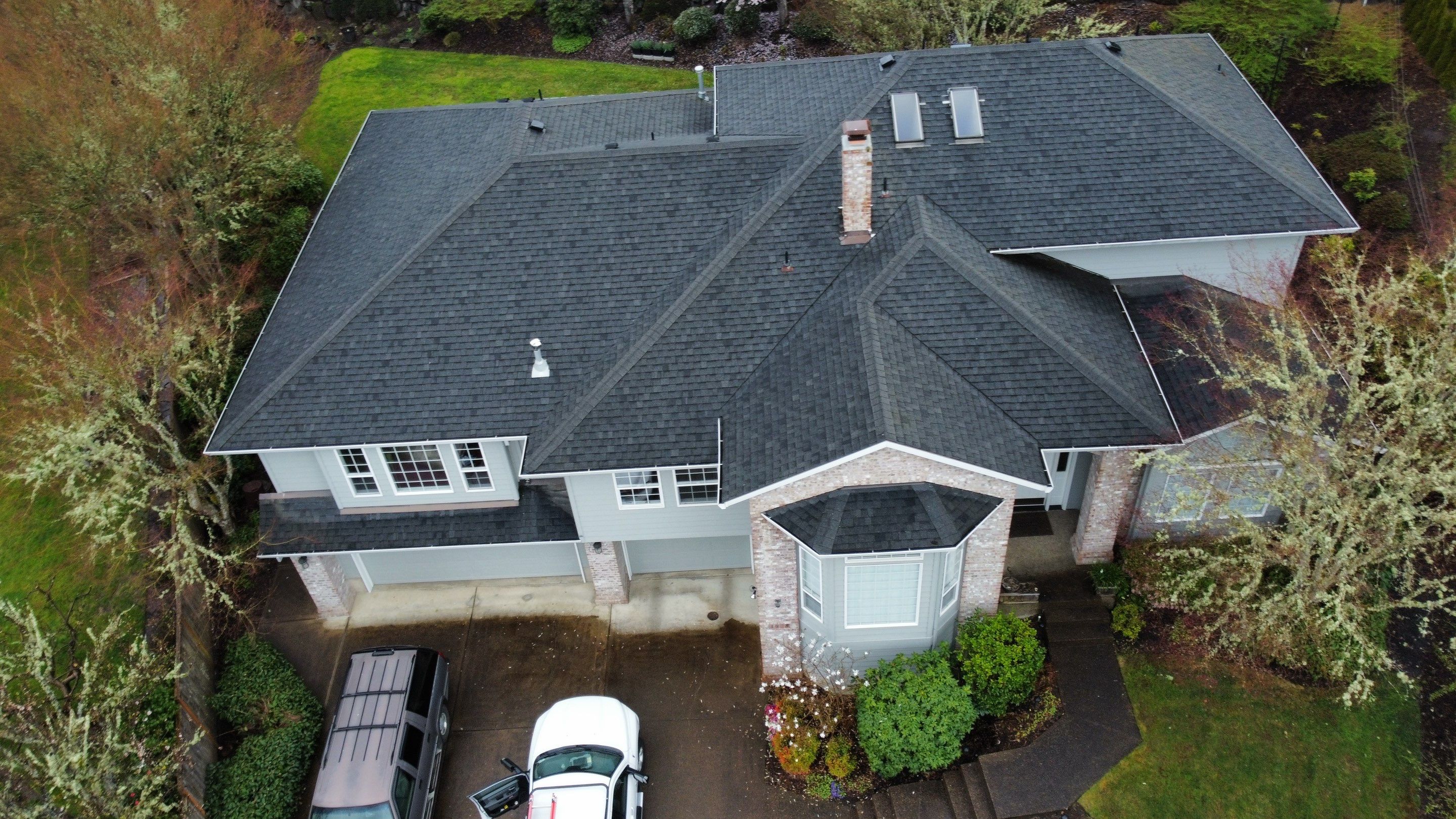 Residential Roofing Installation using IKO Dynasty (Color: Granite Black) by Orezona Building & Roofing Company, Inc.