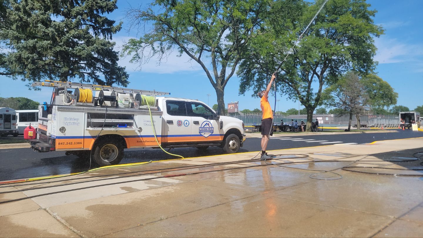 commercial pressure washing using Algaecide, soft wash soap by Northern Power Washing LLC.