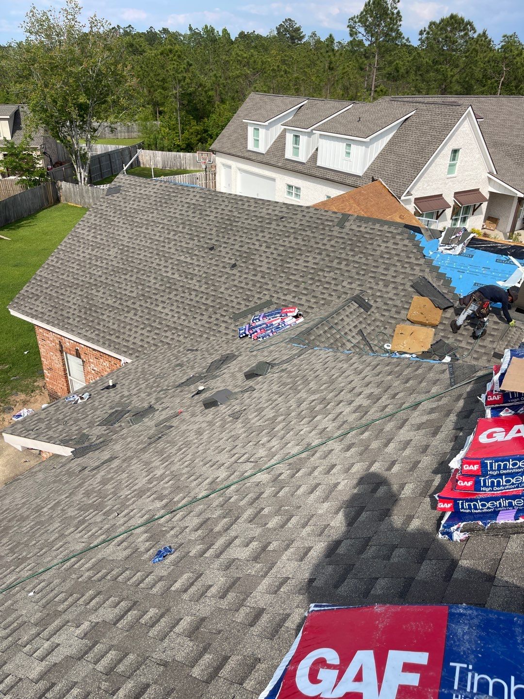 Residential Roofing Installation using Roof Replacement by American Roofing & Construction LLC