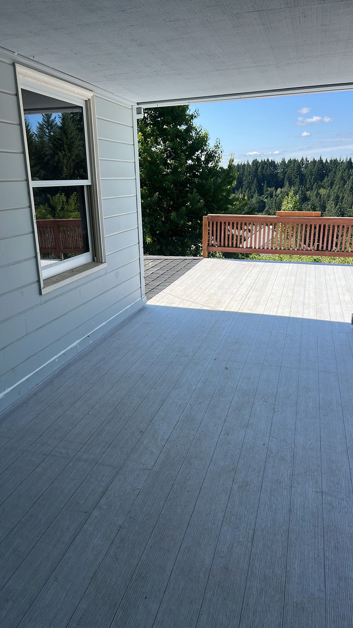 Residential Deck Replacement using Dec-Tec Membrane Color: Grafton by Orezona Building & Roofing Company, Inc.