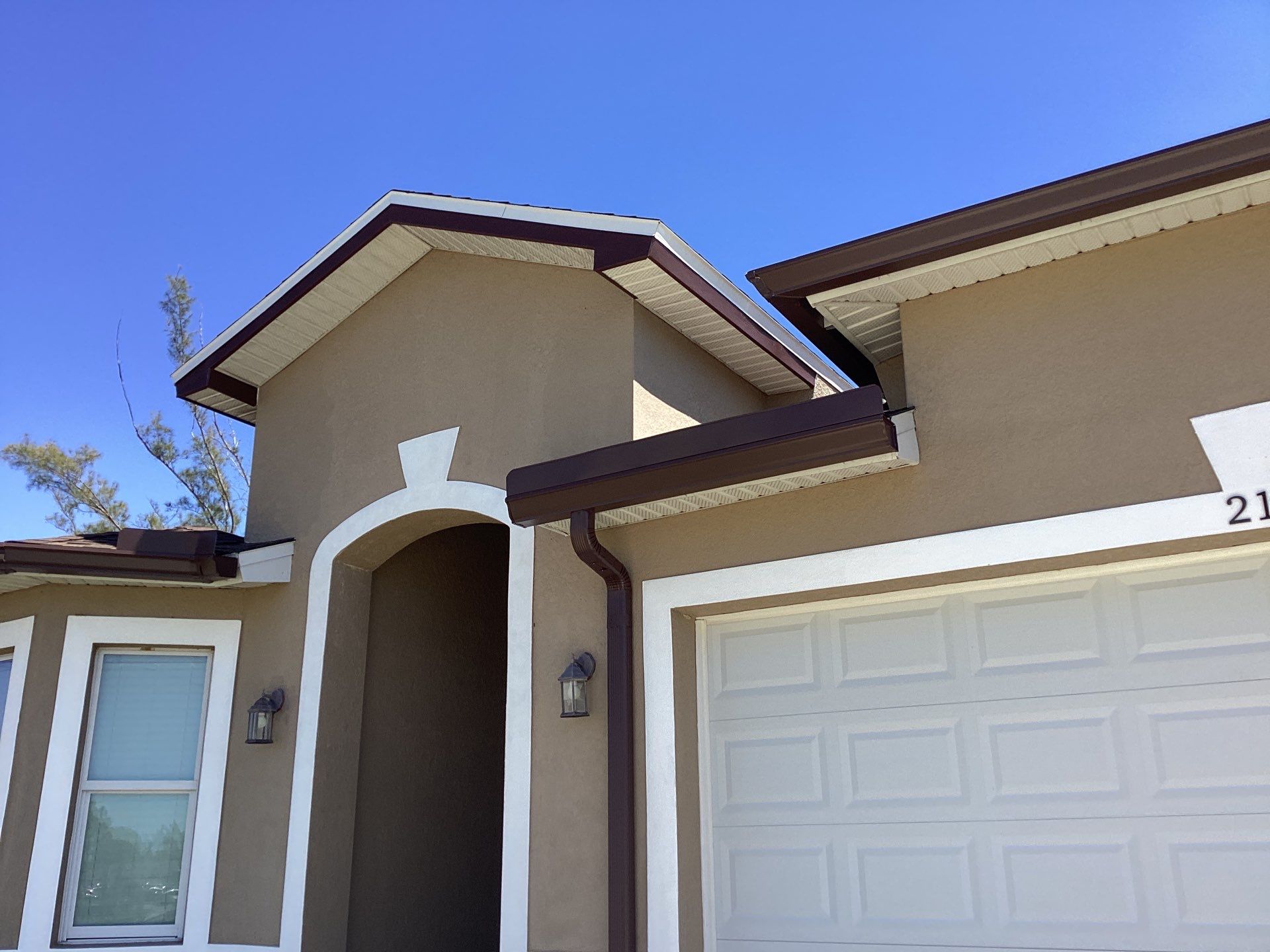 Royal Brown Seamless Gutters in Cape Coral FL by Gutter Professors
